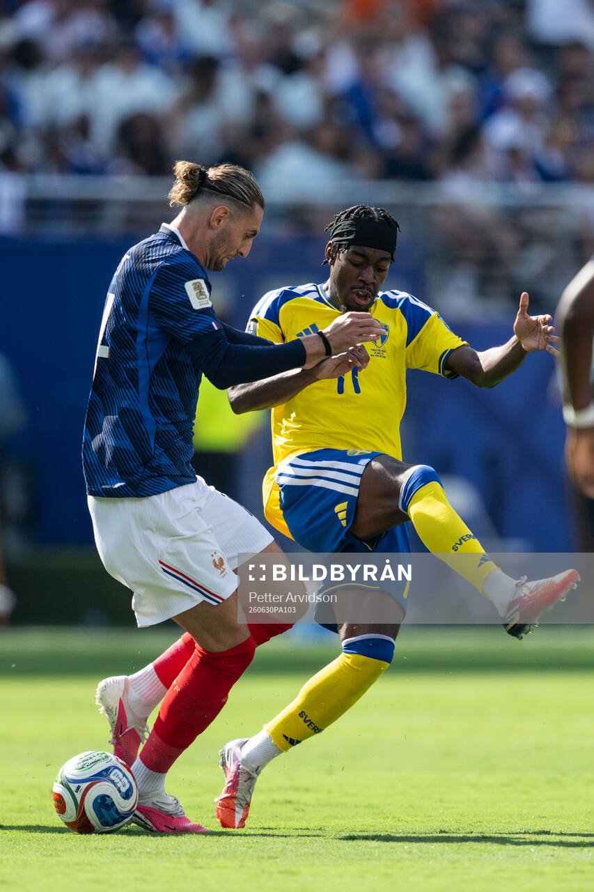 Adrien Rabiot of France and Anthony Elanga of Sweden