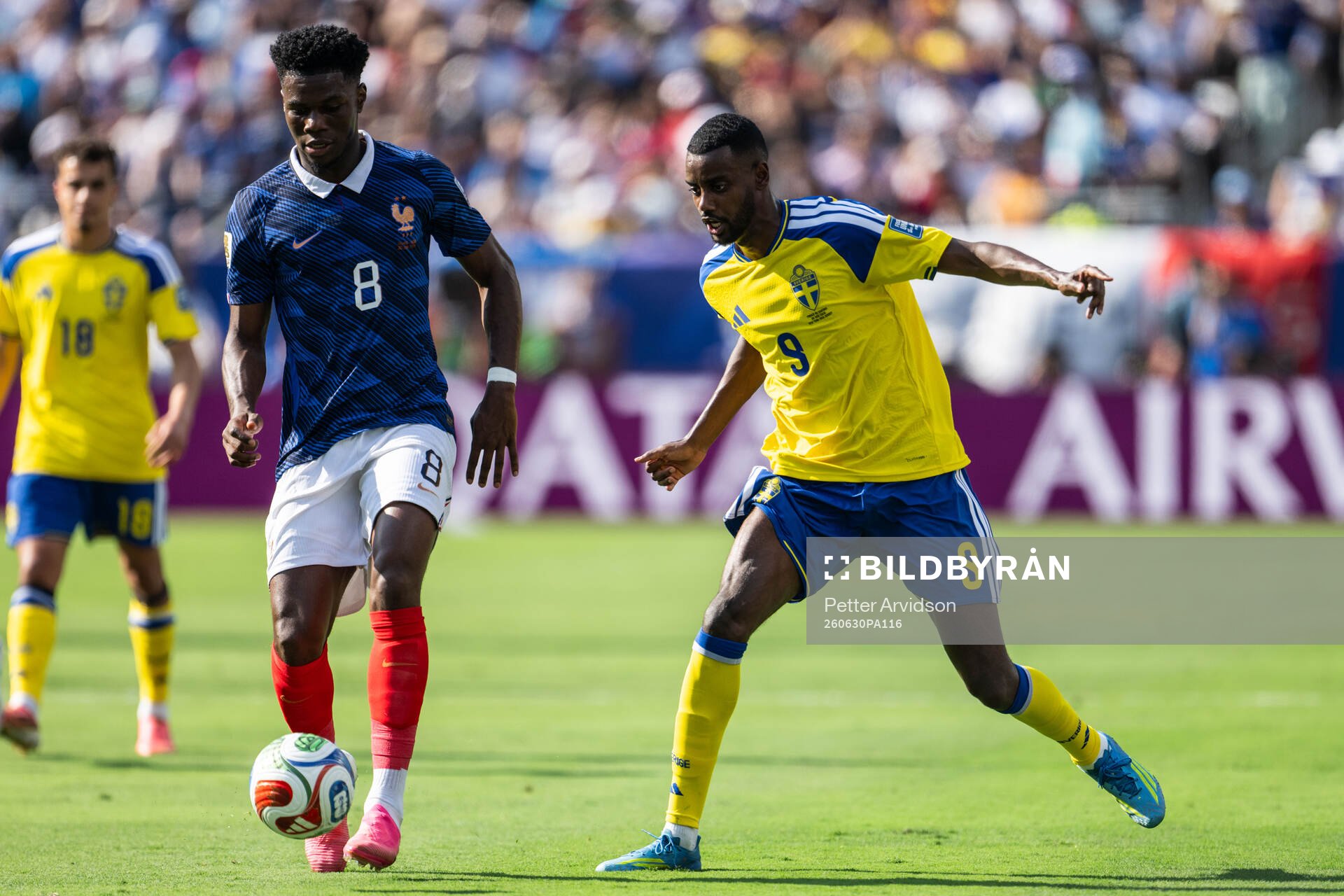 Aurelien Tchouameni of France and Alexander Isak of Sweden