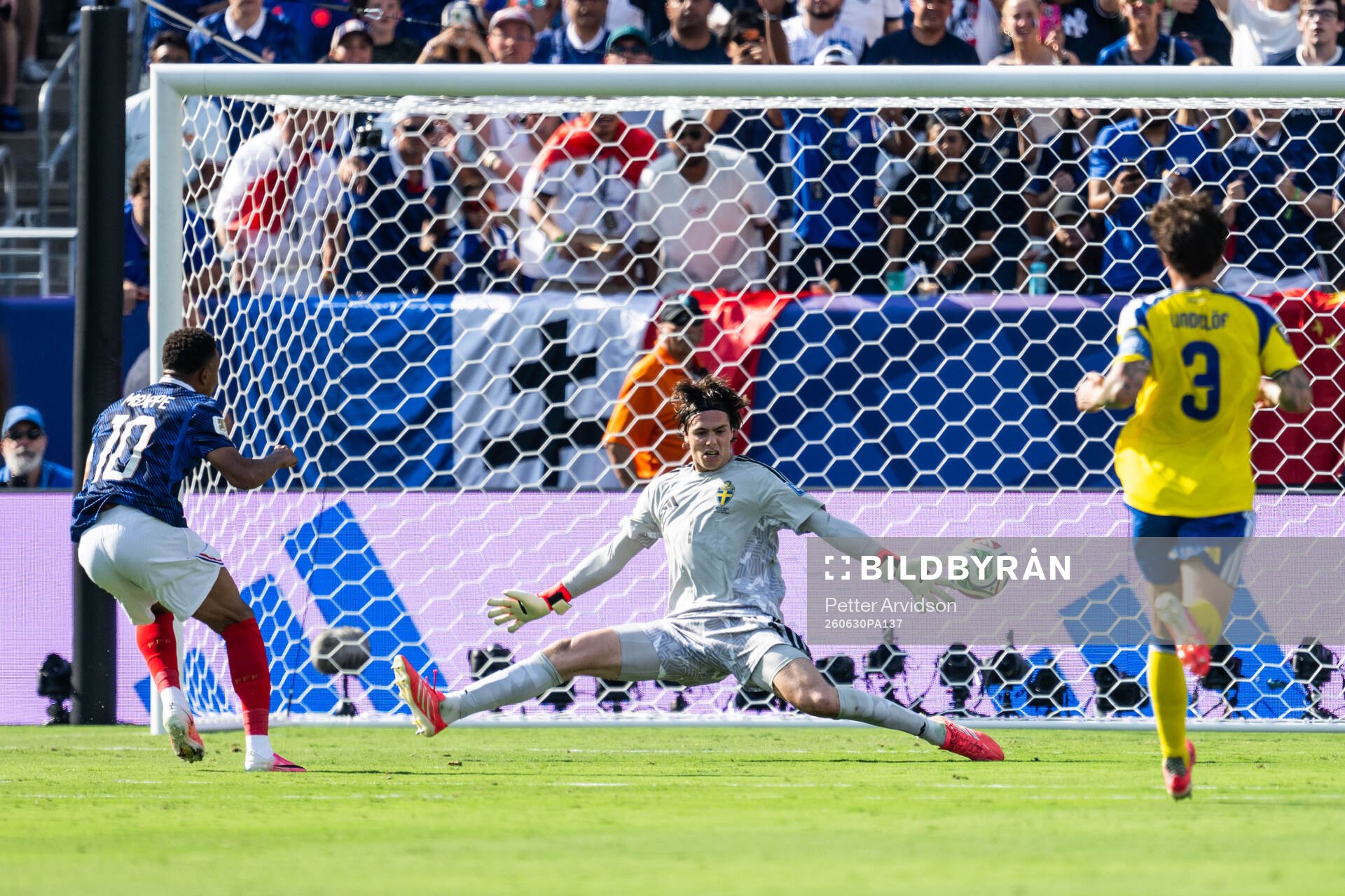 Kylian Mbappe of France and goalkeeper Jacob Widell