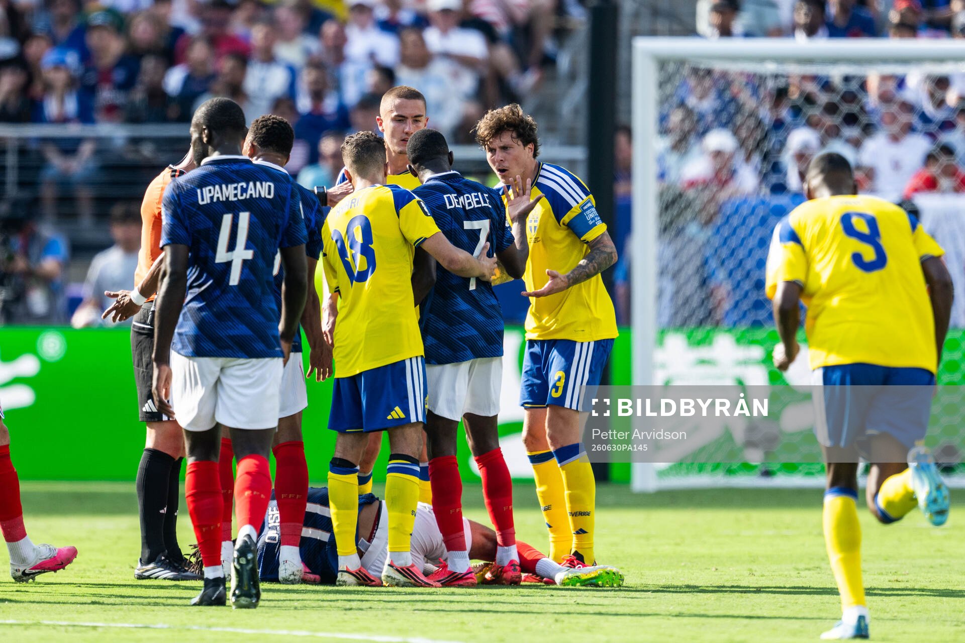Ousmane Dembele of France and Victor Nilsson Lindelöf of