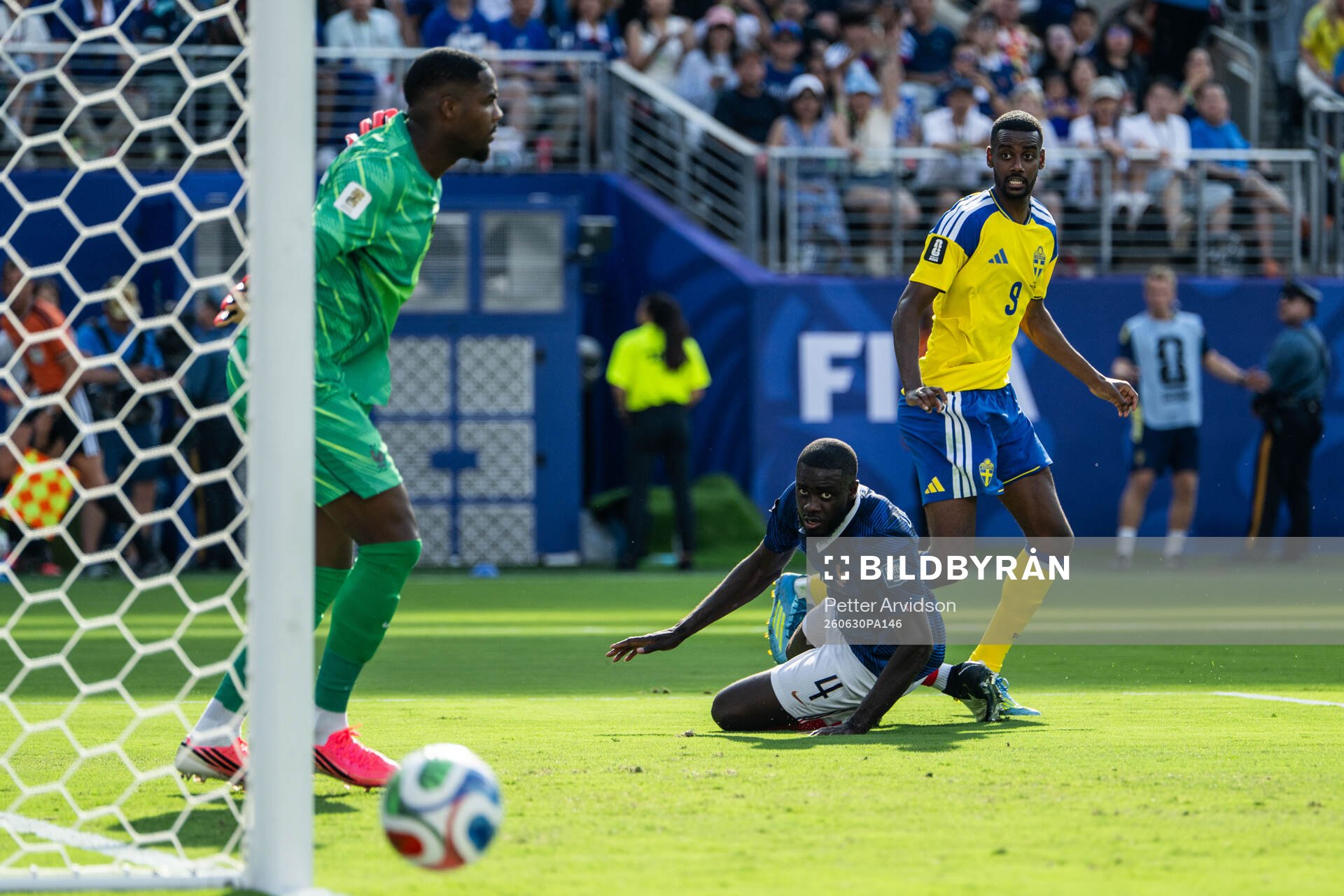 Alexander Isak of Sweden and Dayot Upamecano of France