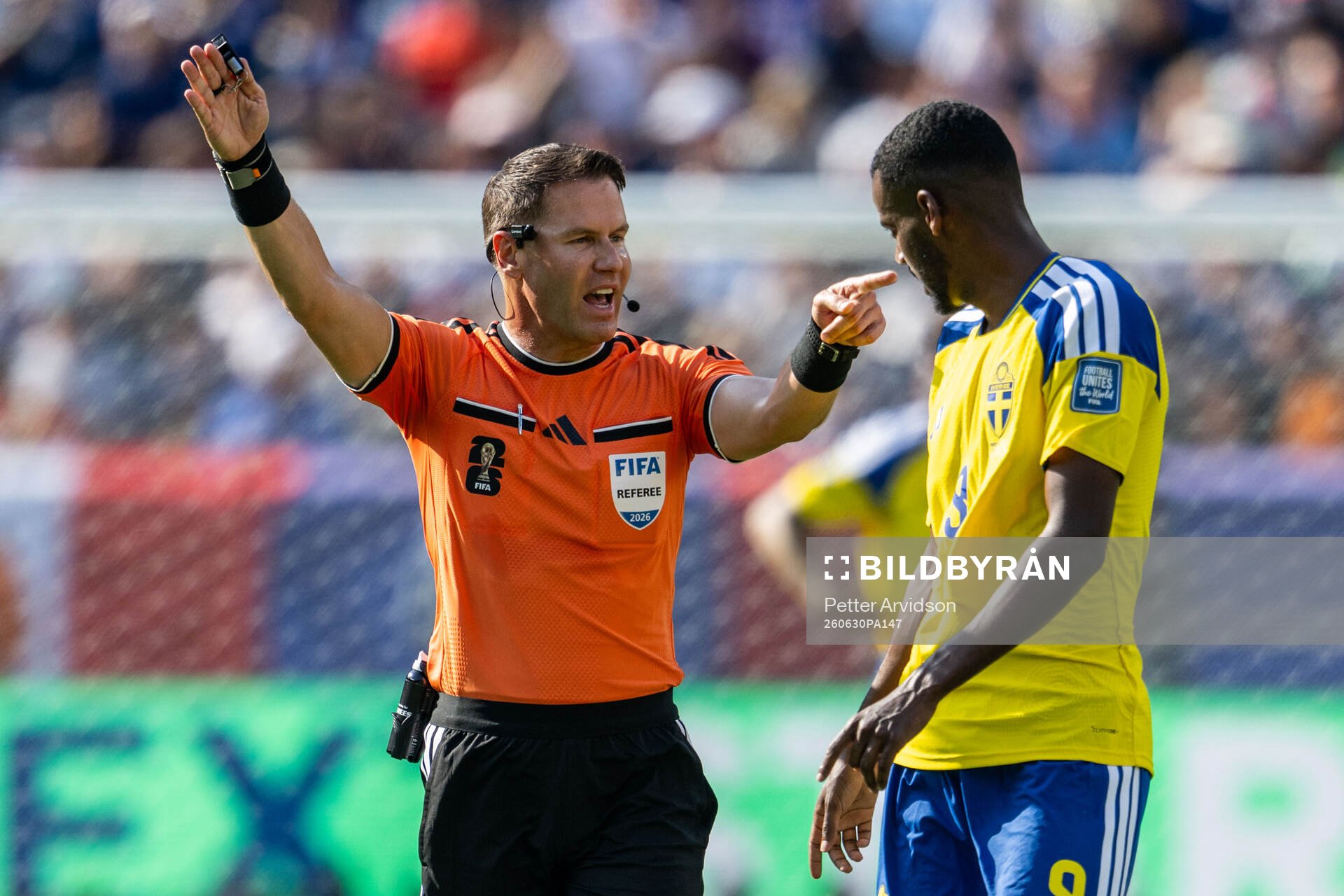 Referee Danny Makkelie and Alexander Isak of Sweden