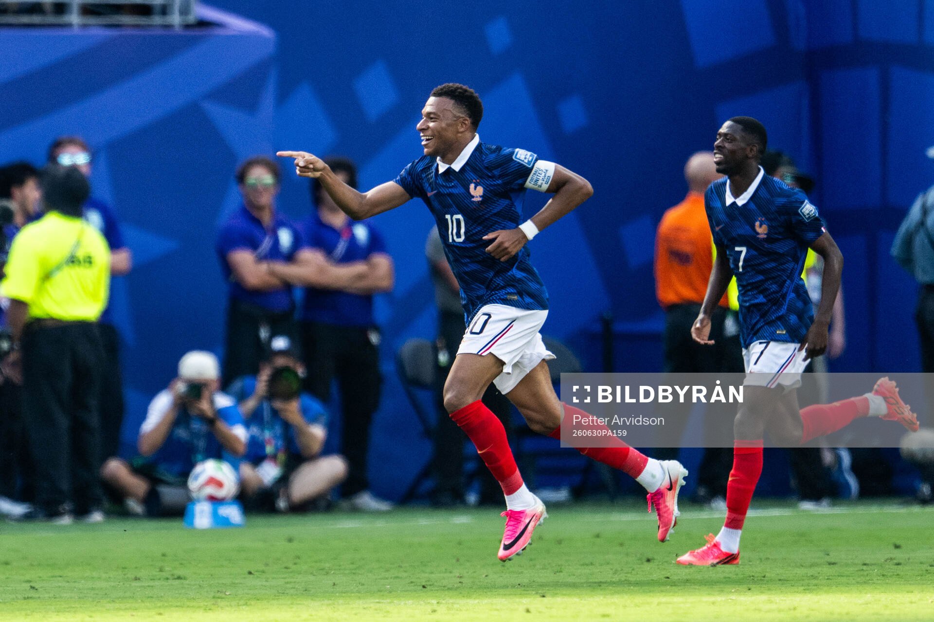 Kylian Mbappe of France celebrates with Ousmane Dembele