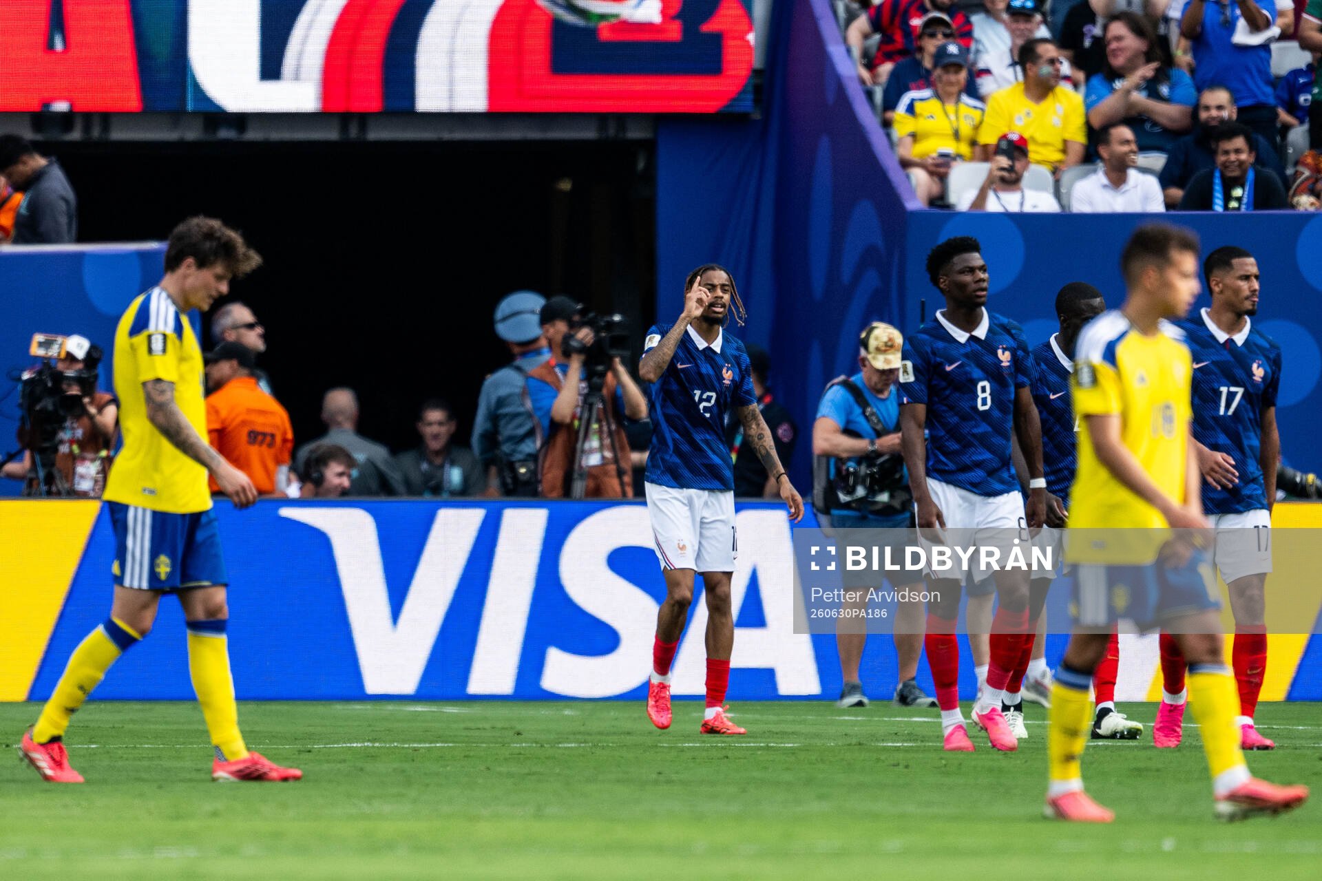 Bradley Barcola of France celebrates
