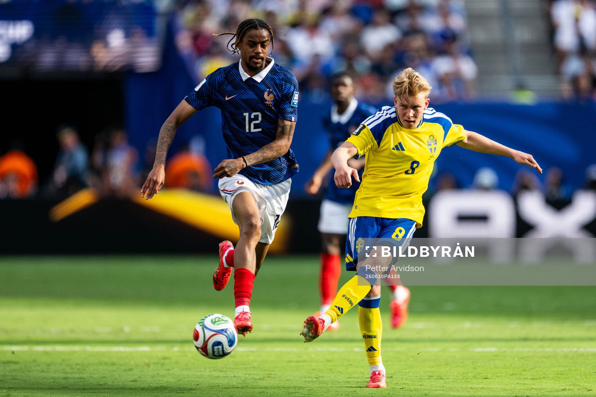 Bradley Barcola of France and Daniel Svensson of Sweden