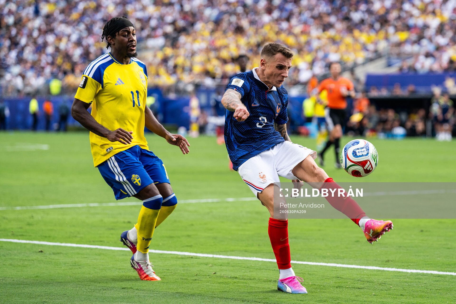 Anthony Elanga of Sweden and Lucas Digne of France