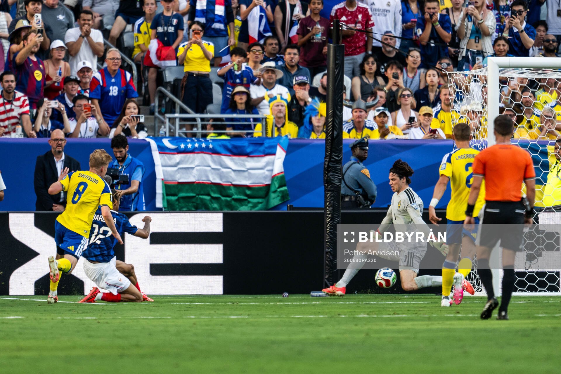 Bradley Barcola of France and goalkeeper Jacob Widell