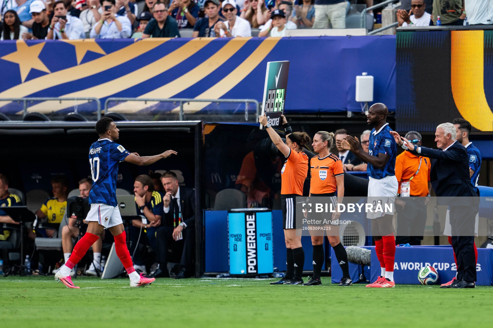 Kylian Mbappe and head coach Didier Claude Deschamps of