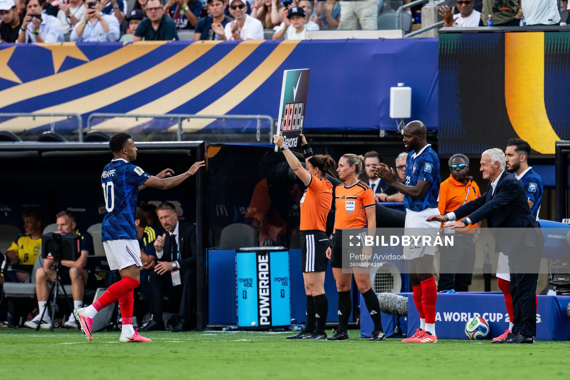 Kylian Mbappe and head coach Didier Claude Deschamps of