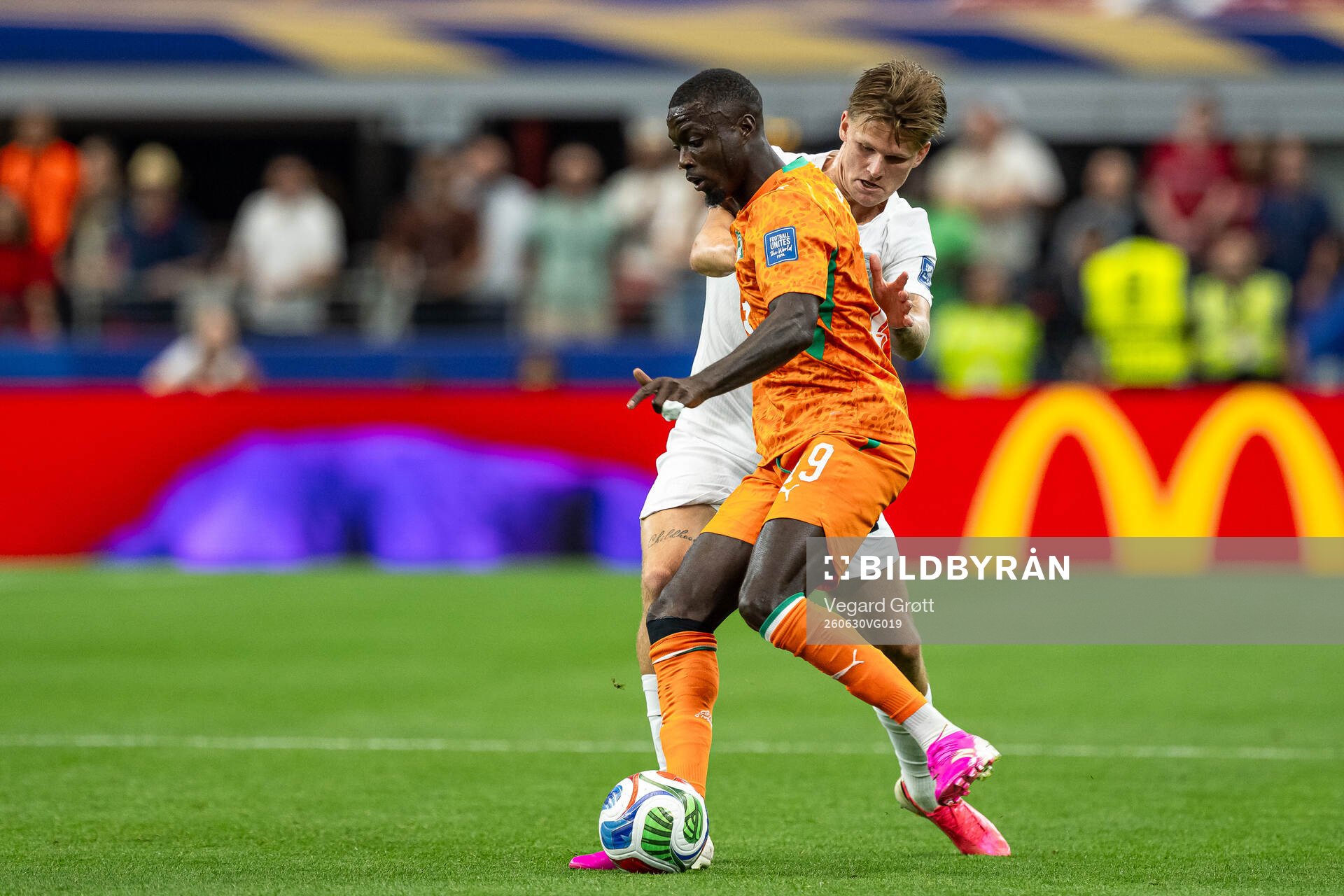 Nicolas Pepe of Côte d'Ivoire and David Møller Wolfe of