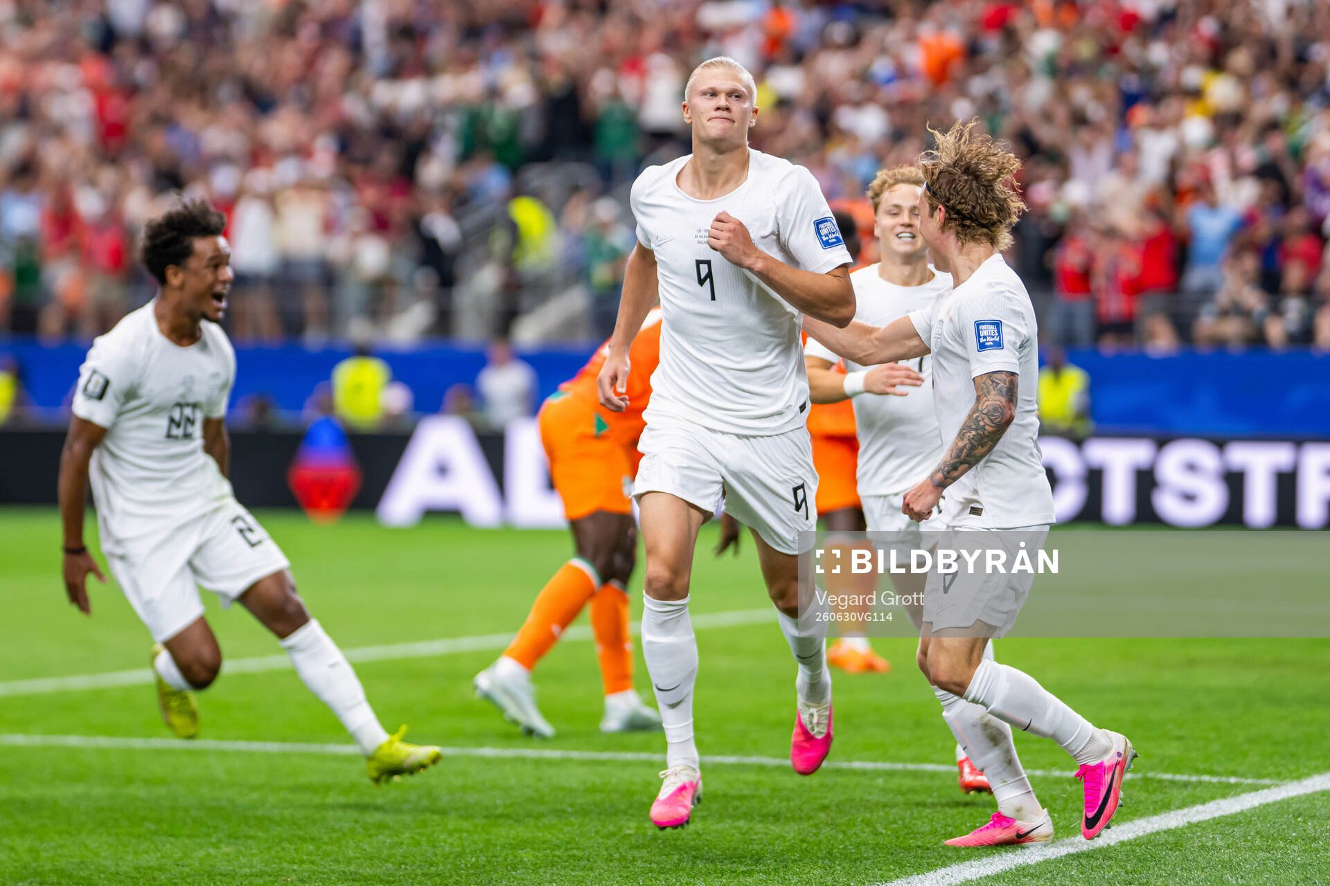 Erling Braut Haaland of Norway celebrates with Oscar Bobb,