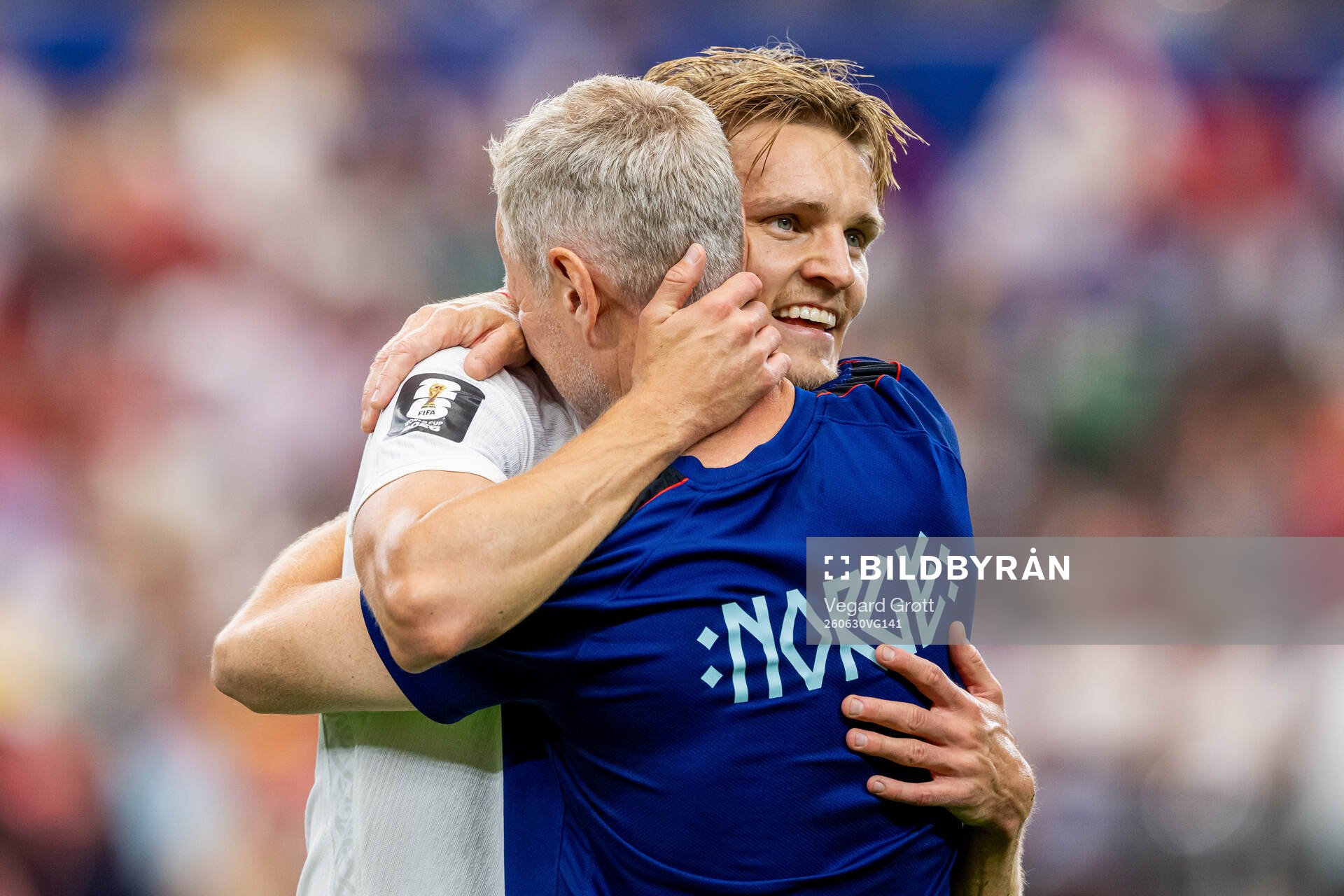 Martin Ødegaard of Norway celebrates with team manager Are