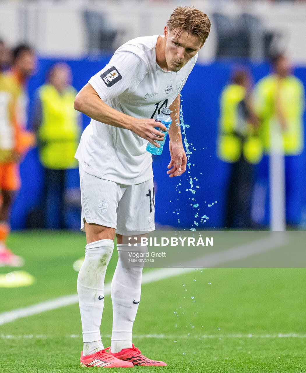 Martin Ødegaard of Norway drinks