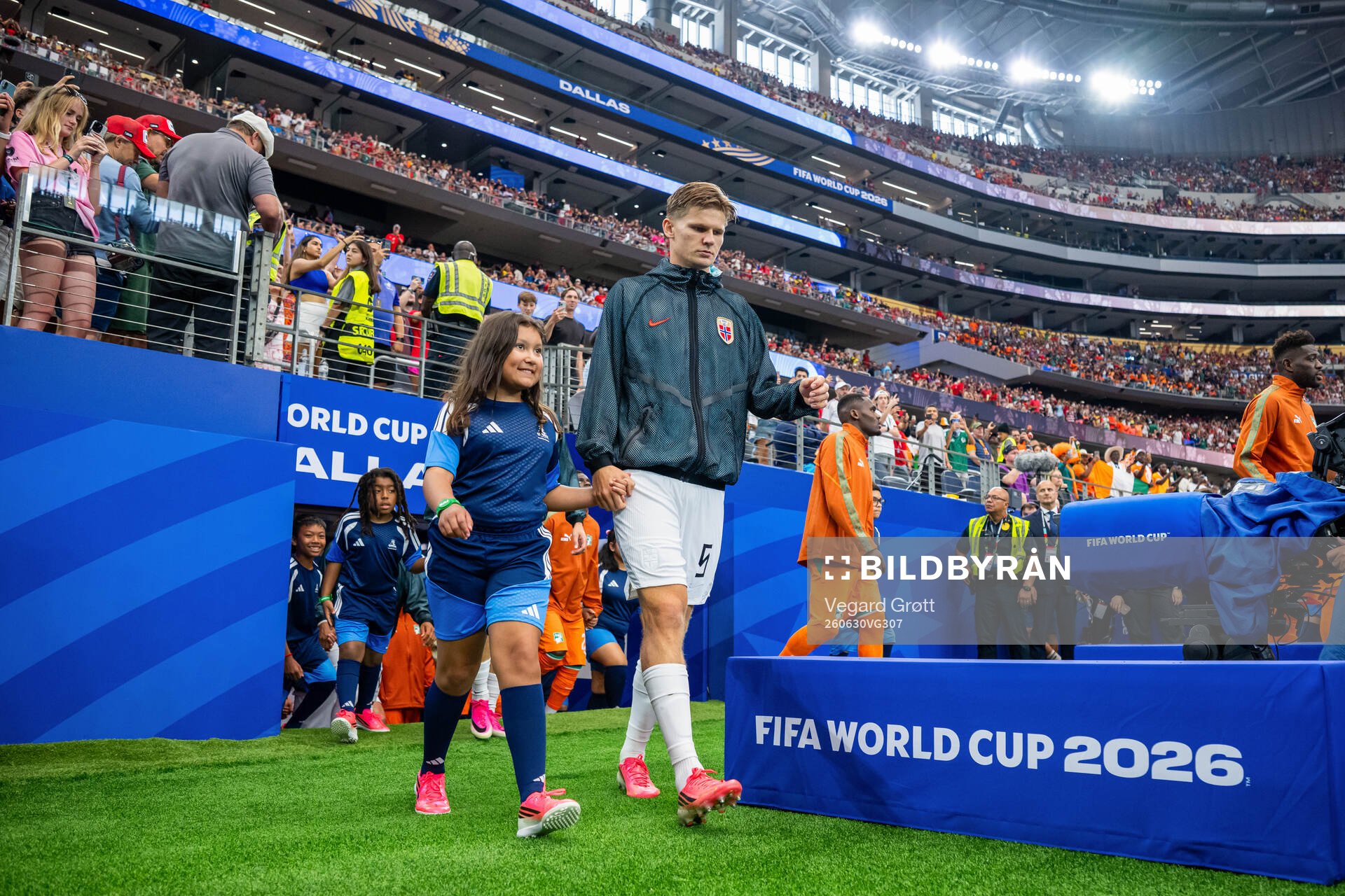 David Møller Wolfe of Norway enters the pitch
