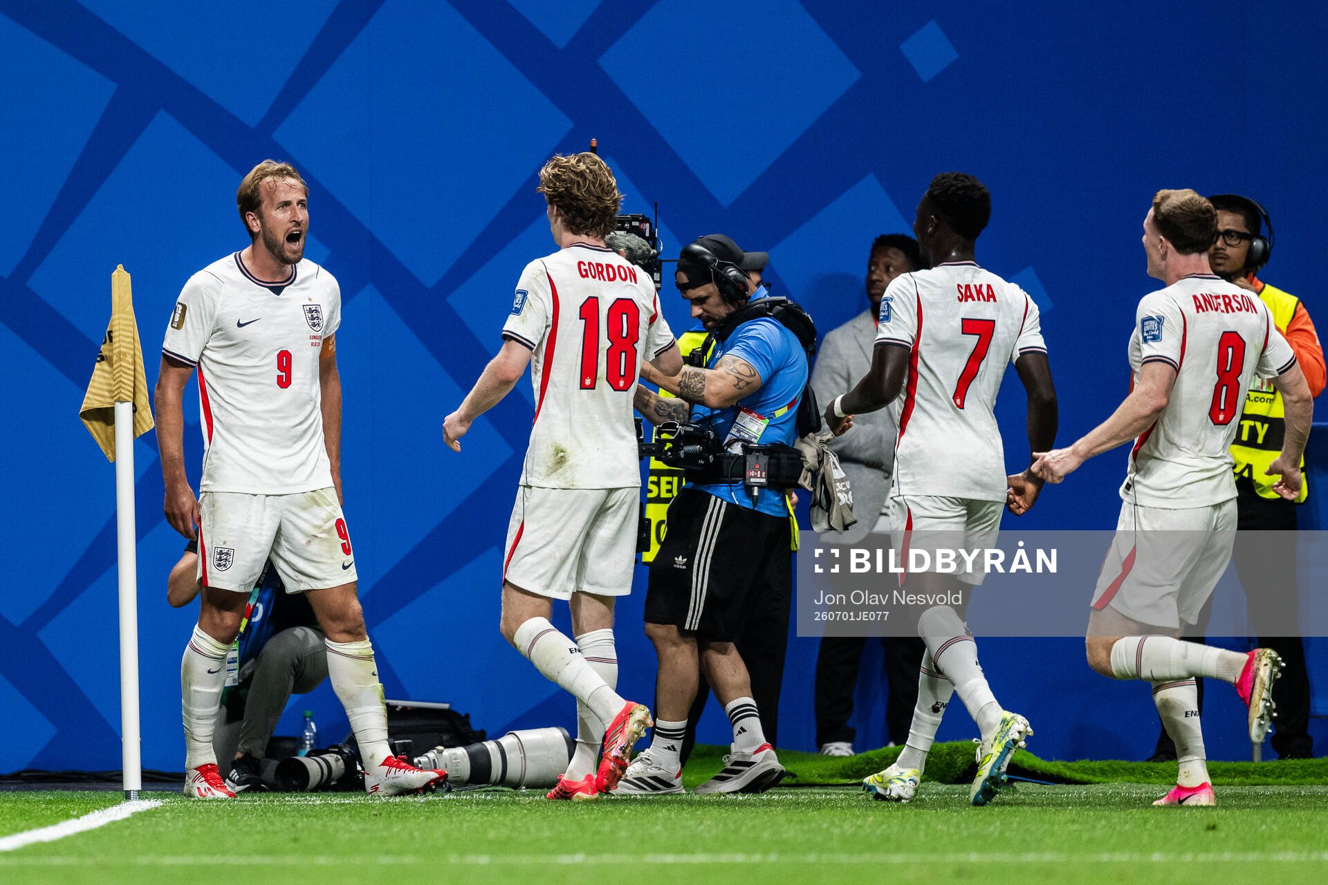 Harry Kane of England celebrates with teammates