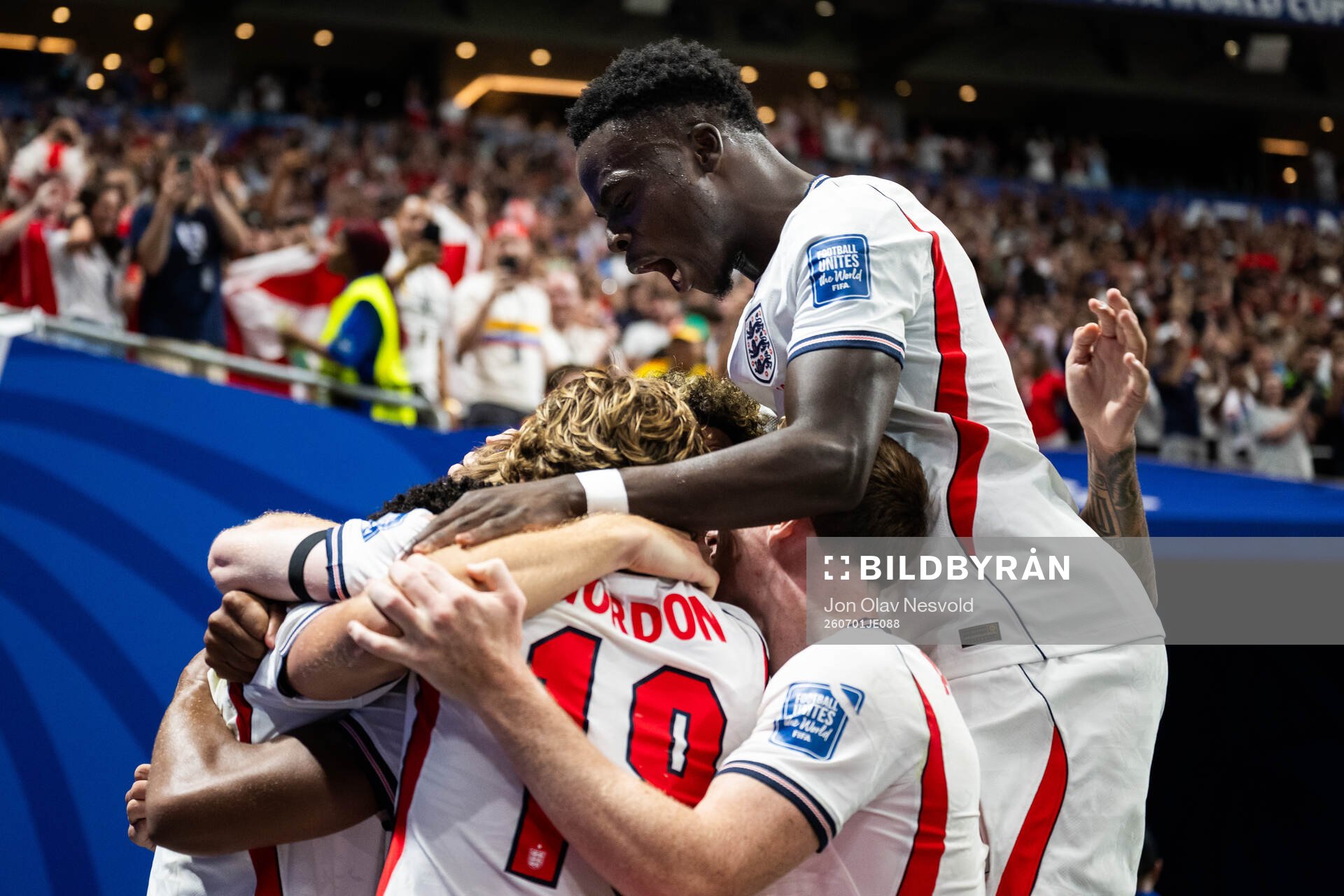 Bukayo Saka of England celebrates with teammates