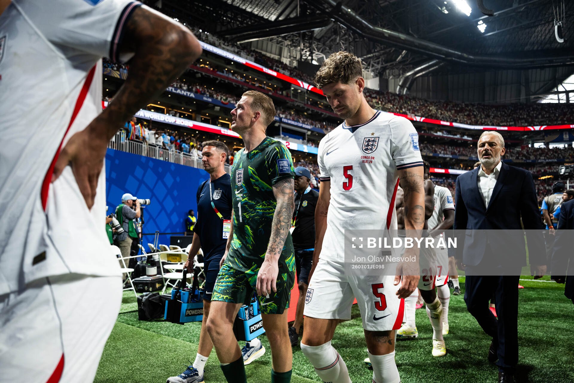 Goalkeeper Jordan Pickford and John Stones of England