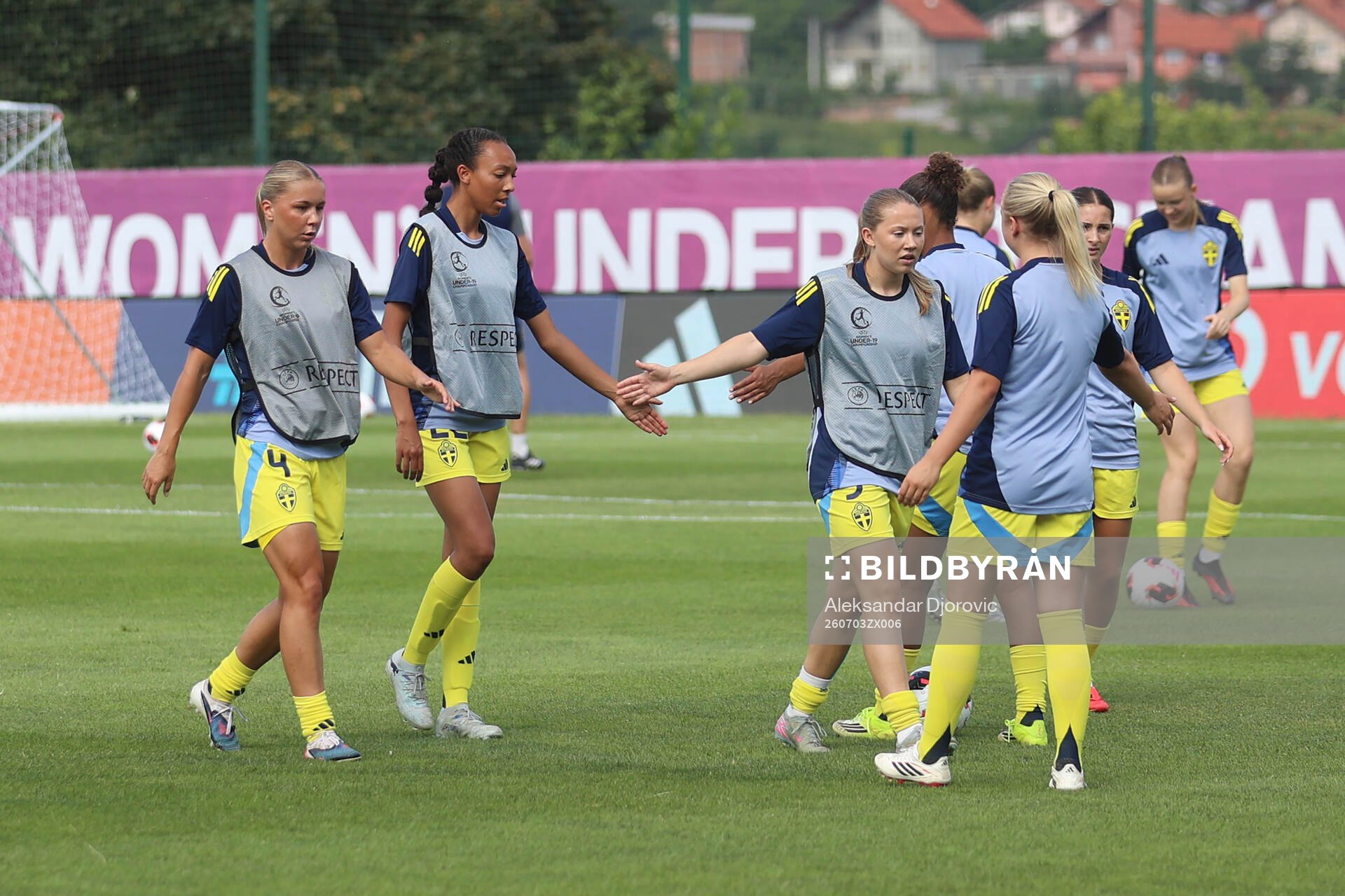 Alice Broman and Olivia Okara of Sweden warm up