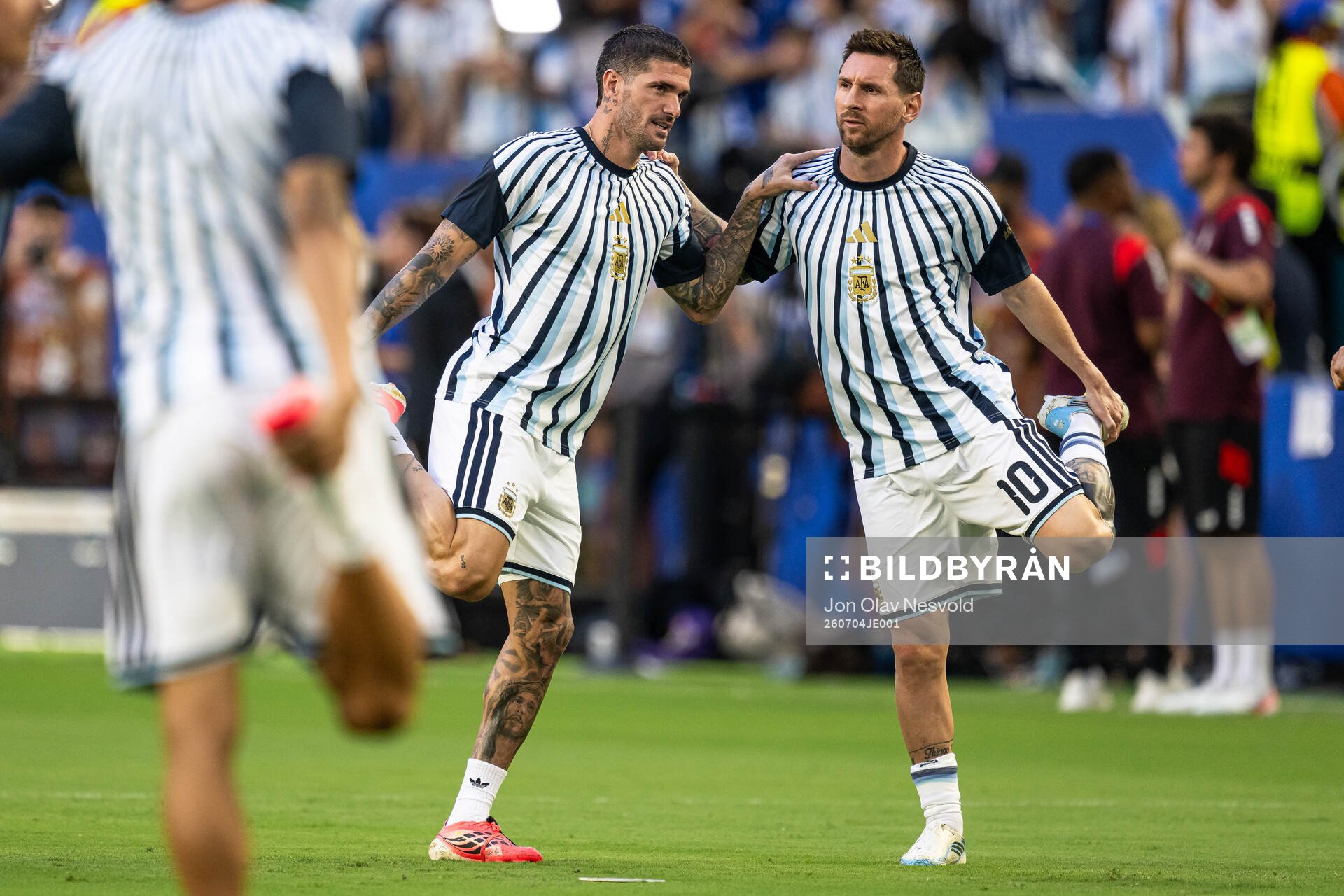 Rodrigo De Paul and Lionel Messi of Argentina