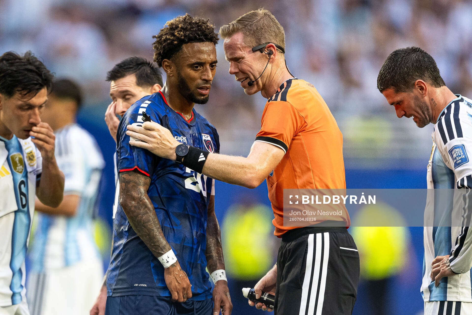 Ryan Mendes of Cabo Verde and Referee Drew Fischer