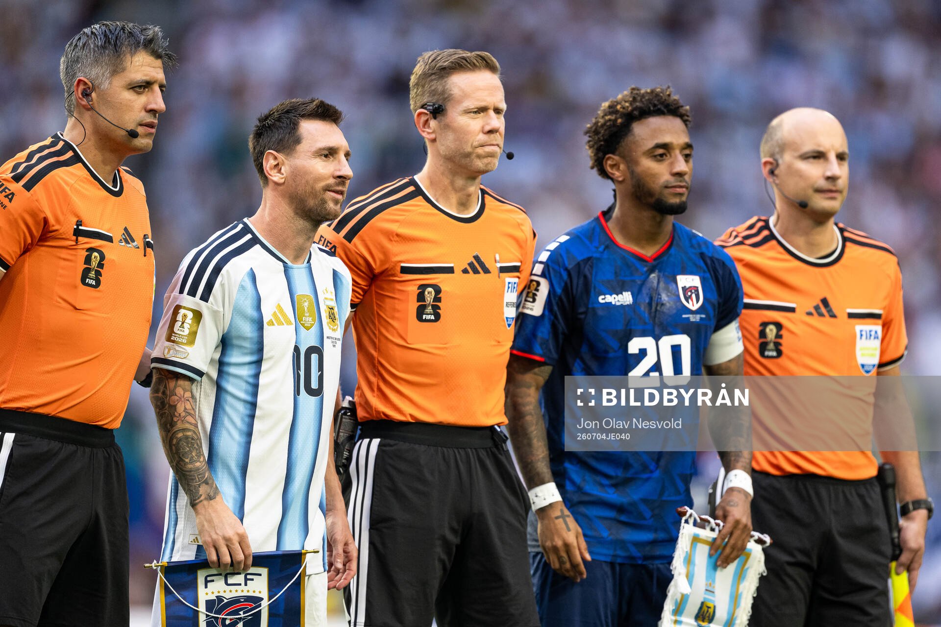 Lionel Messi of Argentina, Referee Drew Fischer and Ryan