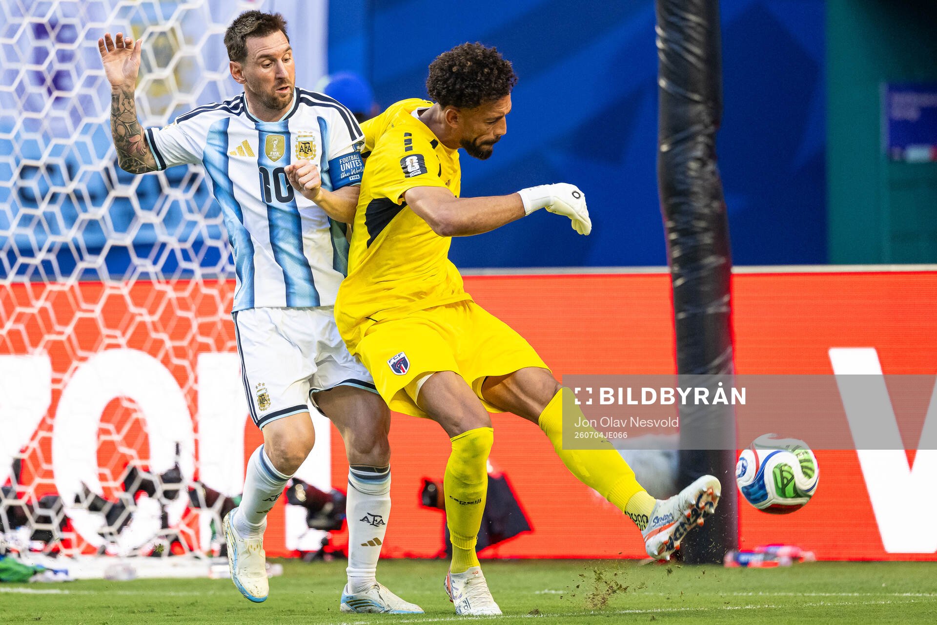 Lionel Messi of Argentina and goalkeeper Vozinha of Cabo