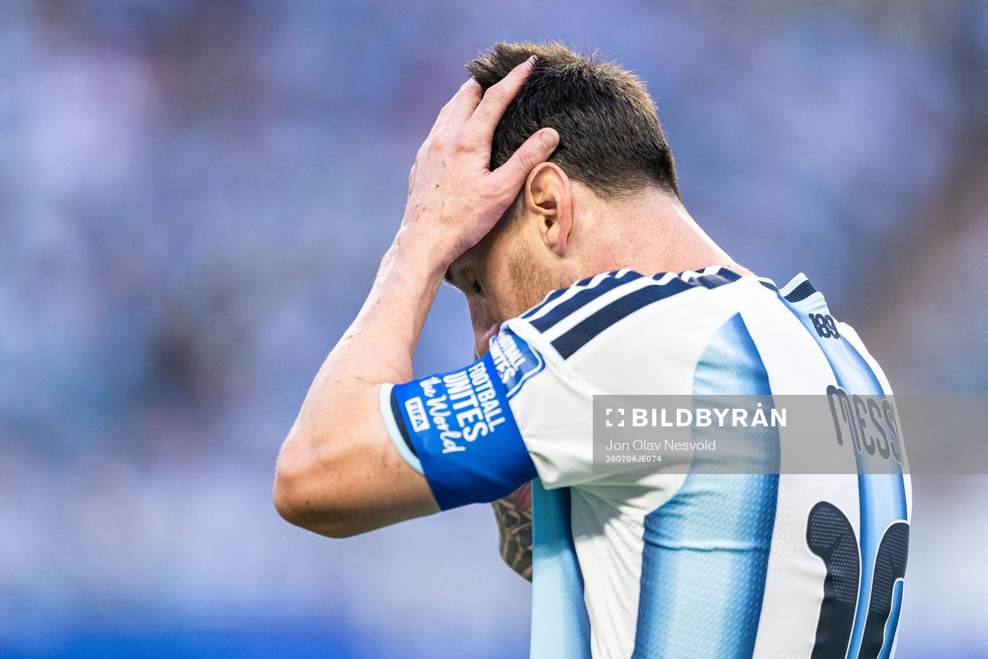 Lionel Messi of Argentina looks dejected