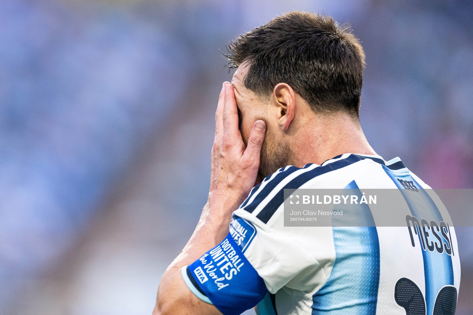 Lionel Messi of Argentina looks dejected