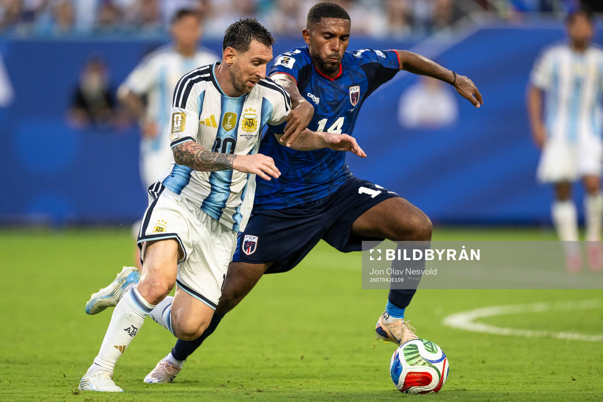 Lionel Messi of Argentina and Deroy Duarte of Cabo Verde