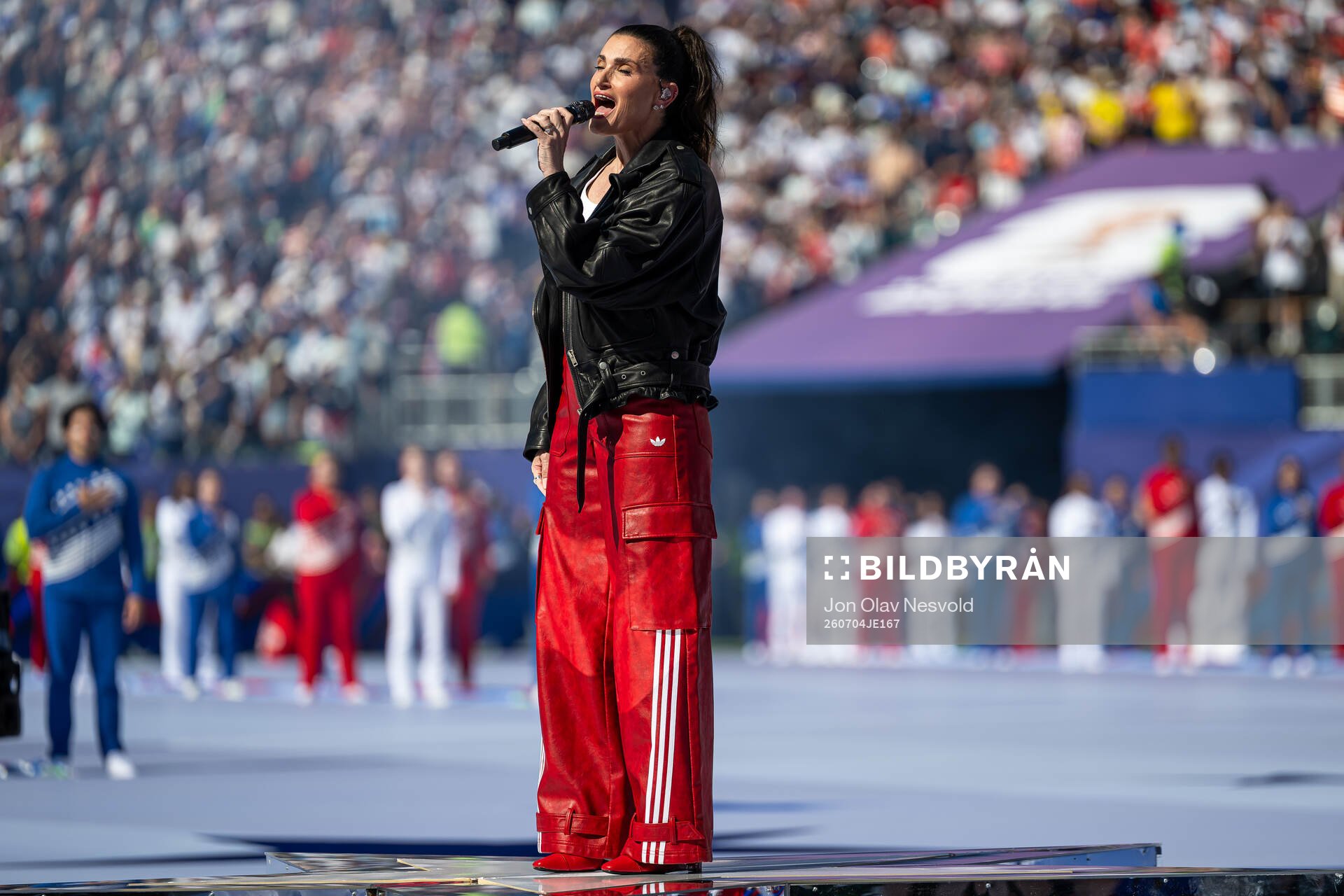 Idina Menzel, artist, sings the national anthem of the