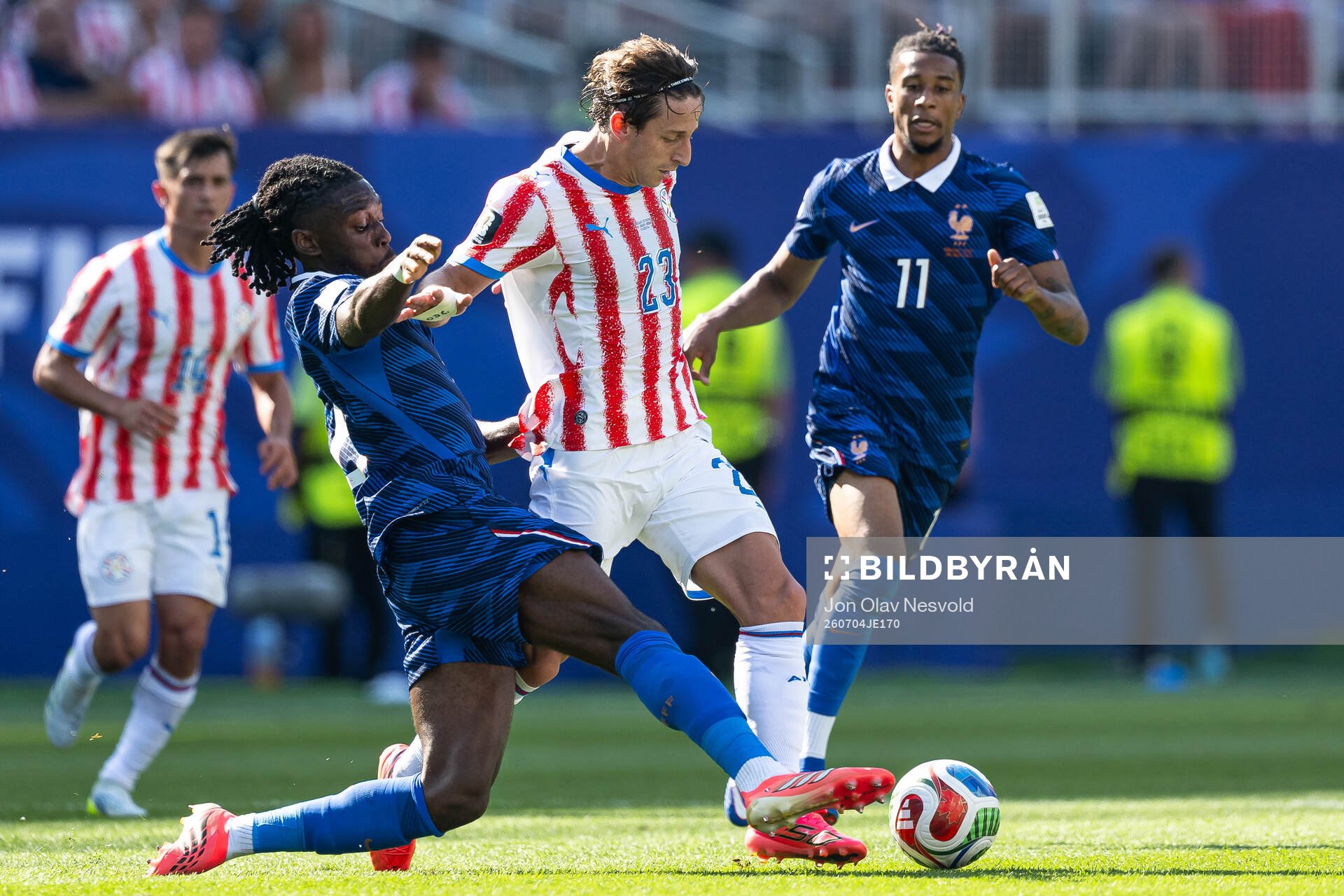 Manu Kone and Michael Olise of France and Matias Galarza of
