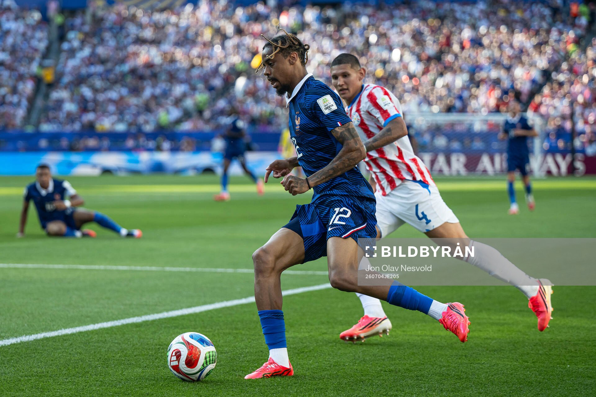 Bradley Barcola of France and Juan Jose Caceres of Paraguay