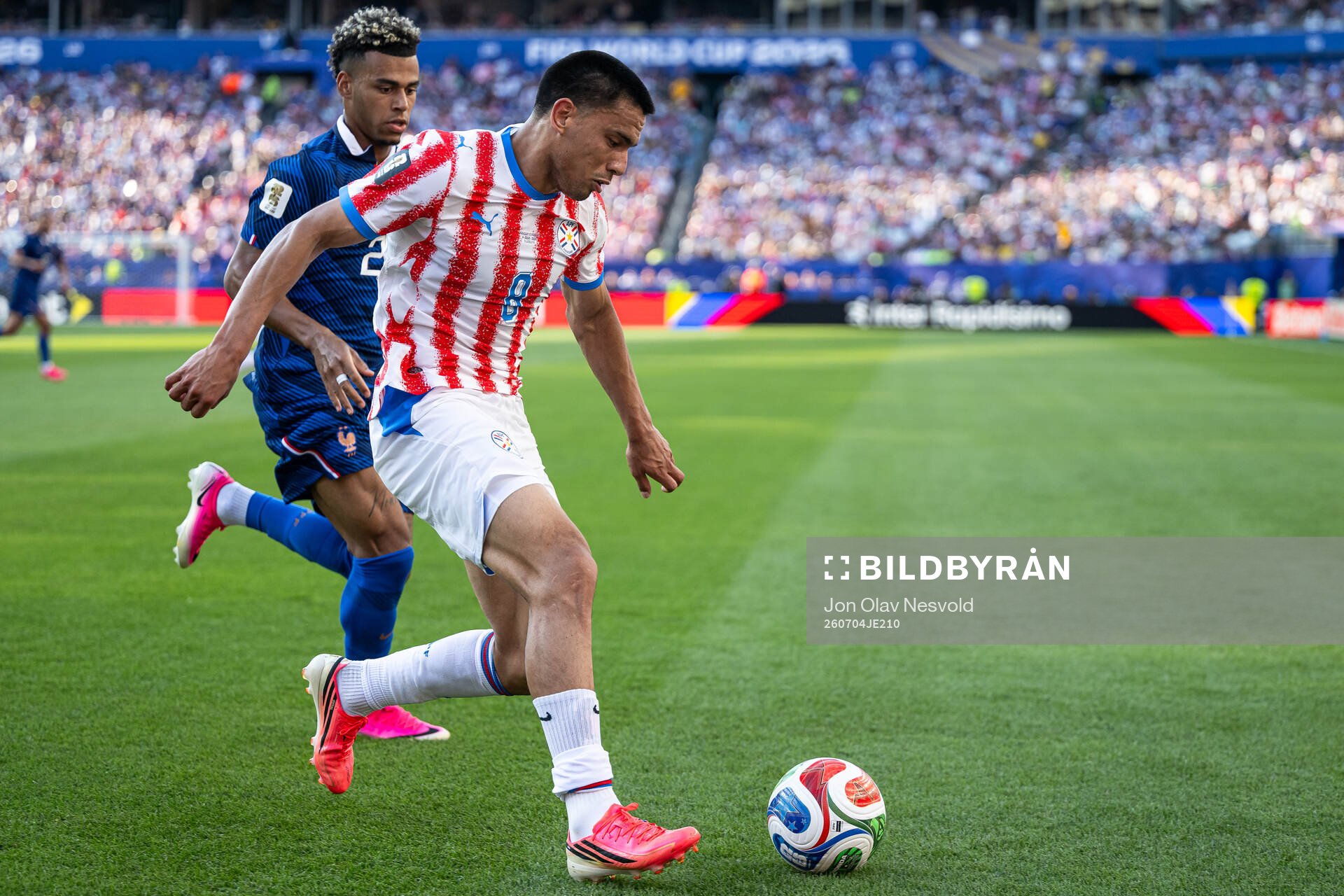 Desire Doue of France and Diego Gomez of Paraguay