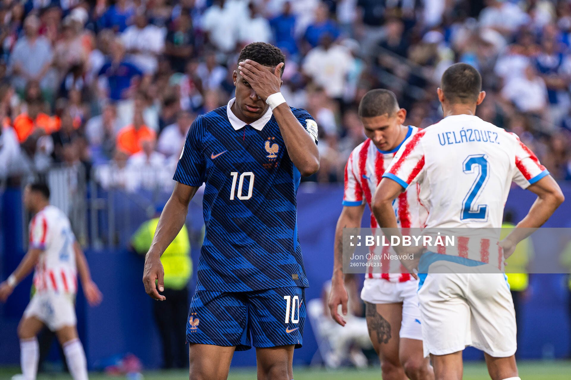 Kylian Mbappe of France looks dejected