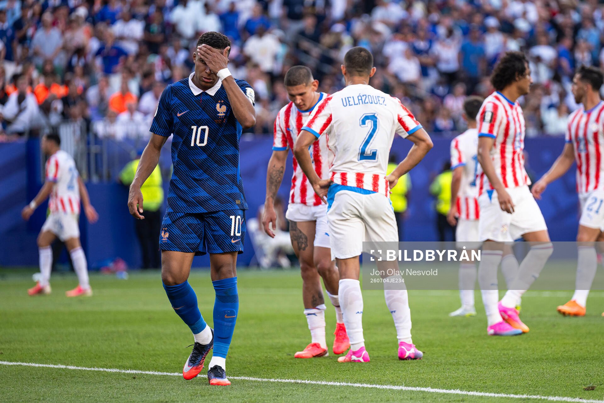 Kylian Mbappe of France looks dejected