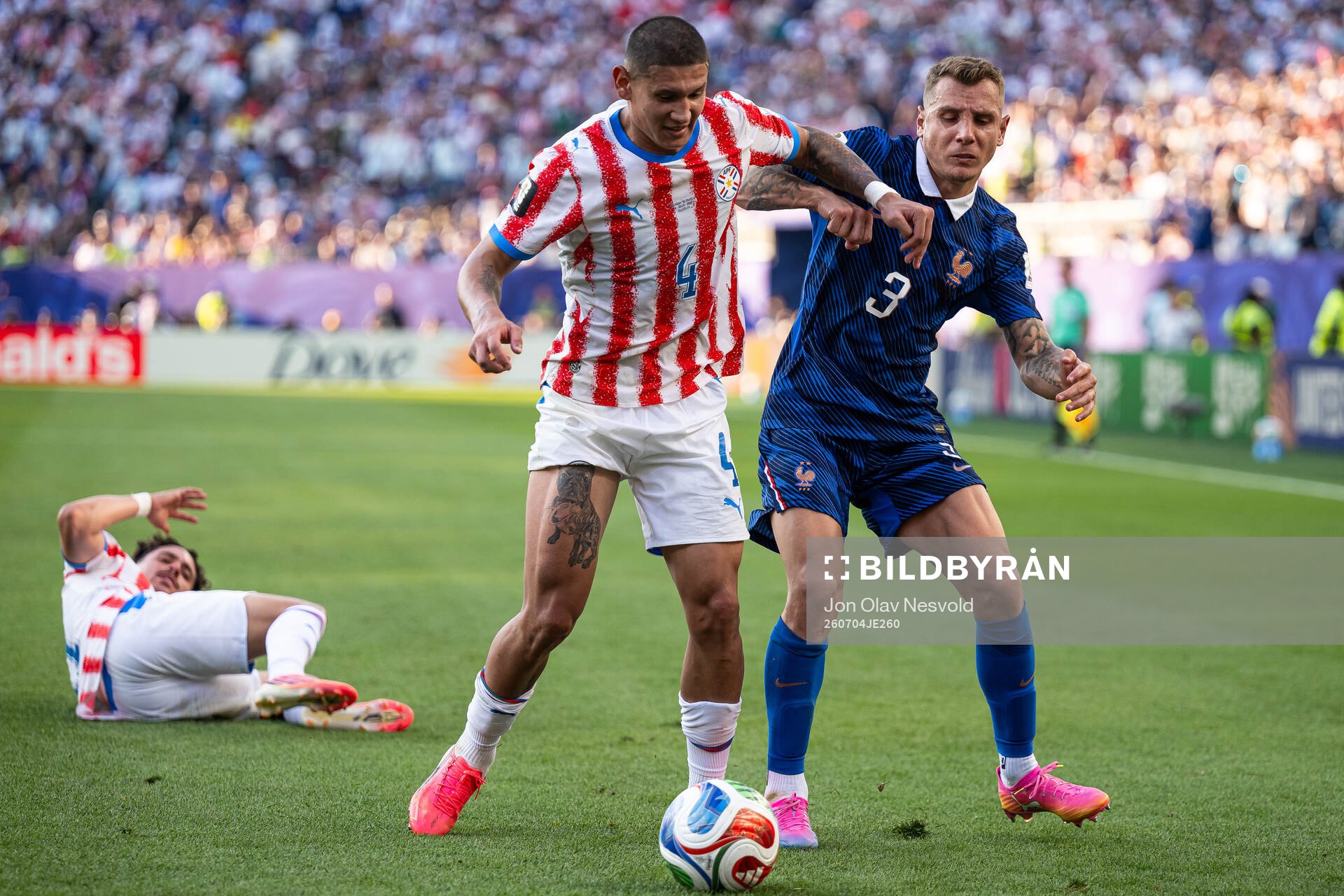Juan Jose Caceres of Paraguay and Lucas Digne of France