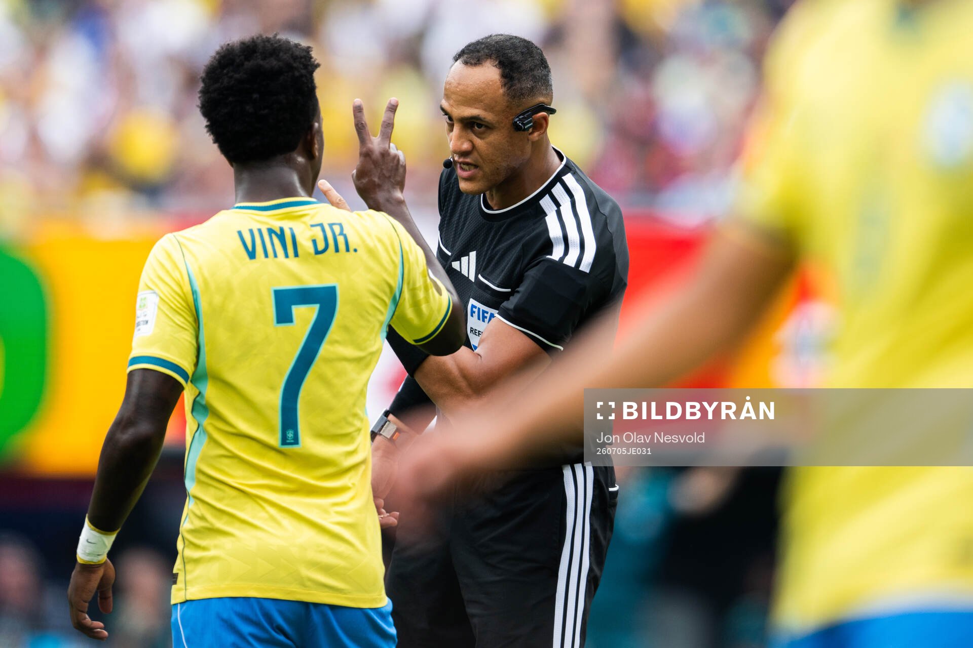 Vinicius Junior of Brazil with referee Ismail Elfath