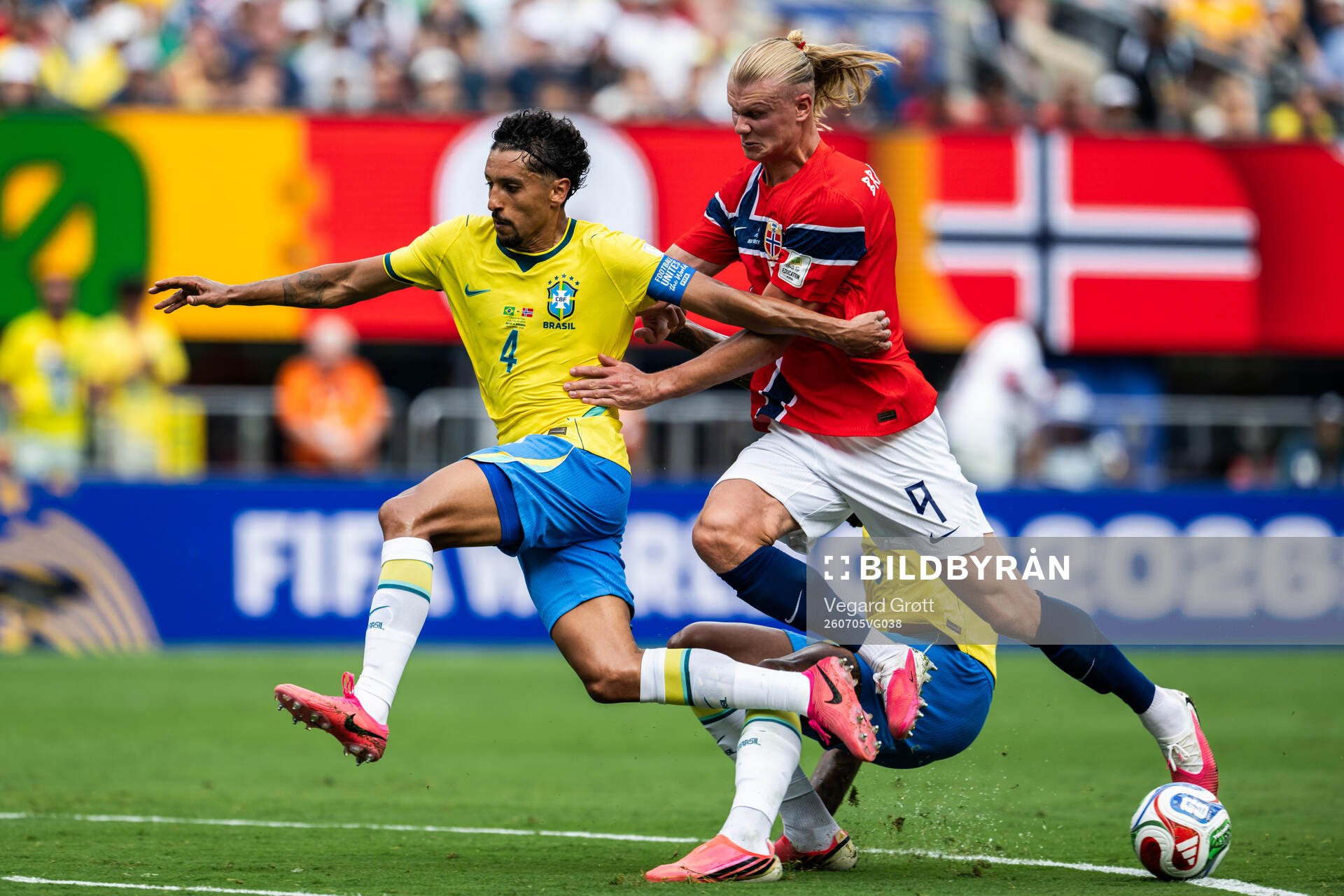 Marquinhos of Brazil and Erling Braut Haaland of Norway
