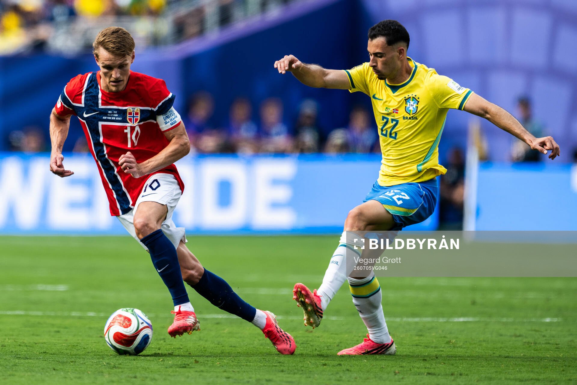 Martin Ødegaard of Norway and Gabriel Martinelli of Brazil