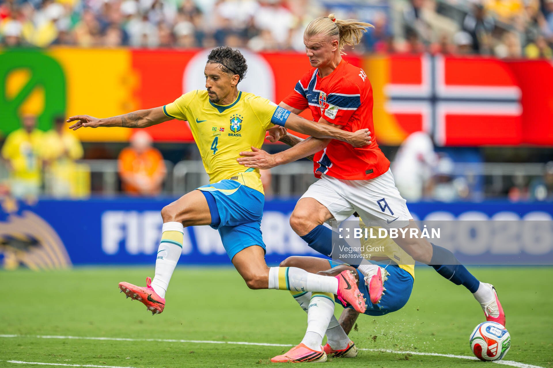 Marquinhos of Brazil and Erling Braut Haaland of Norway