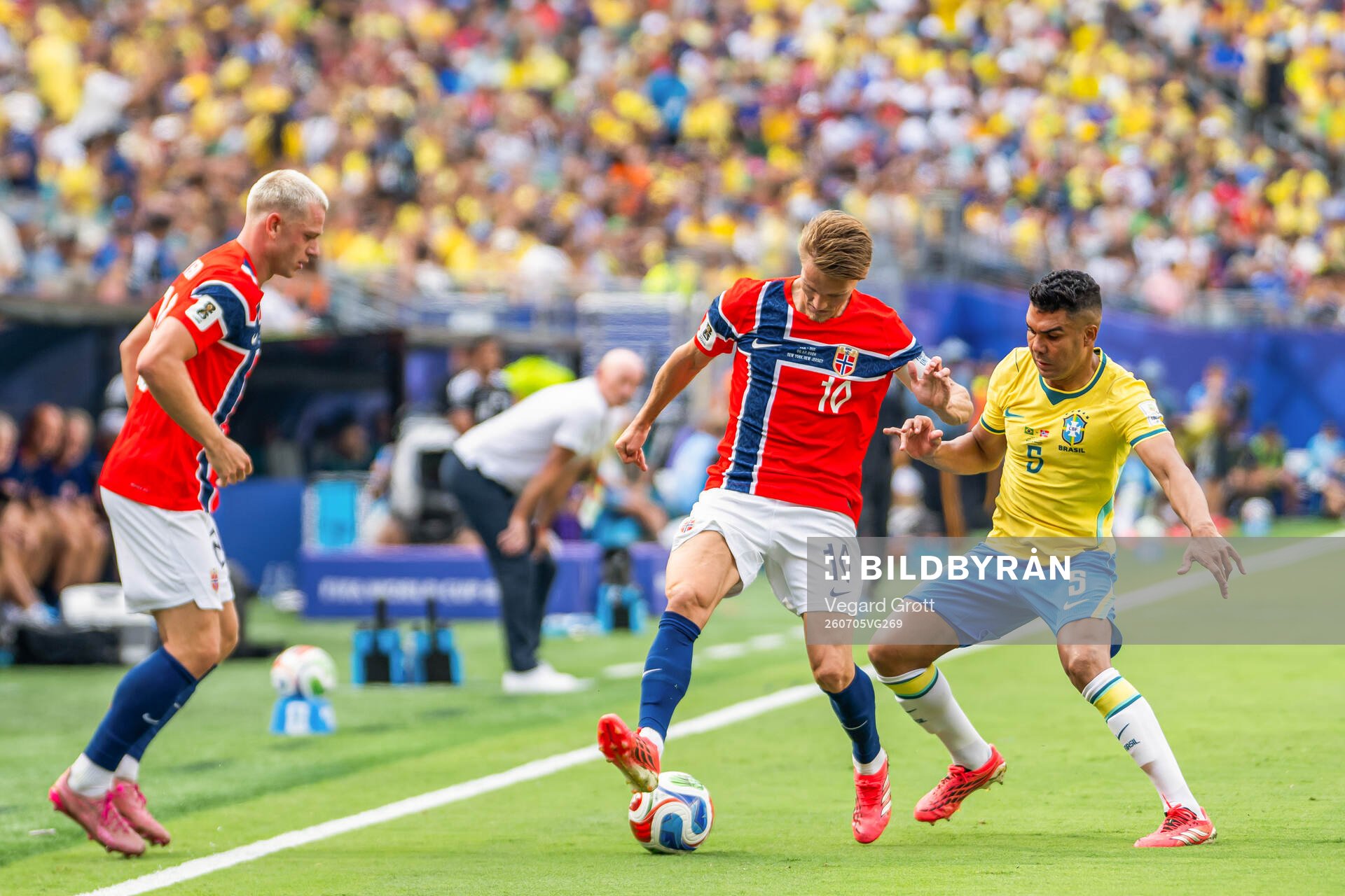 Martin Ødegaard of Norway and Casemiro of Brazil