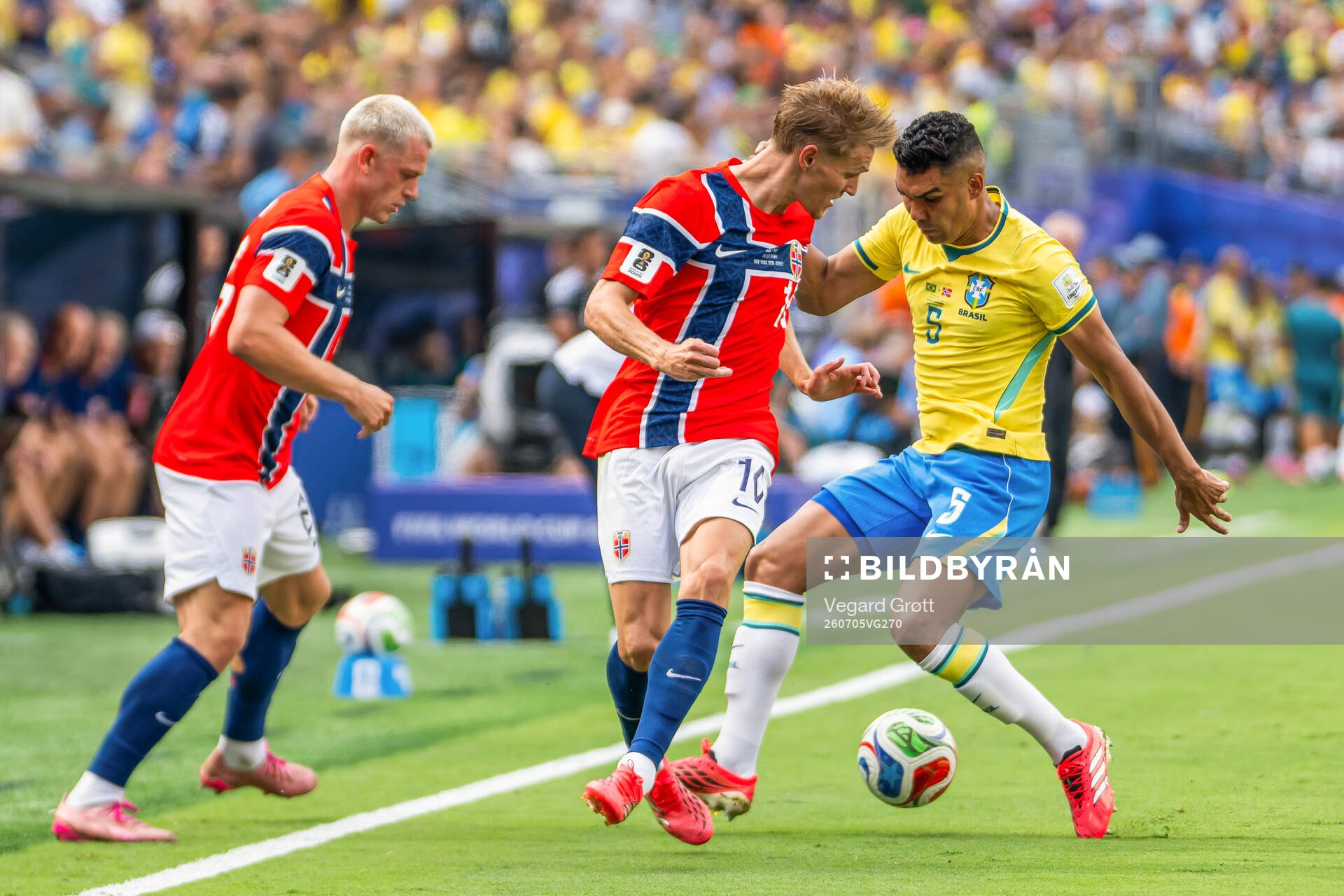 Martin Ødegaard of Norway and Casemiro of Brazil