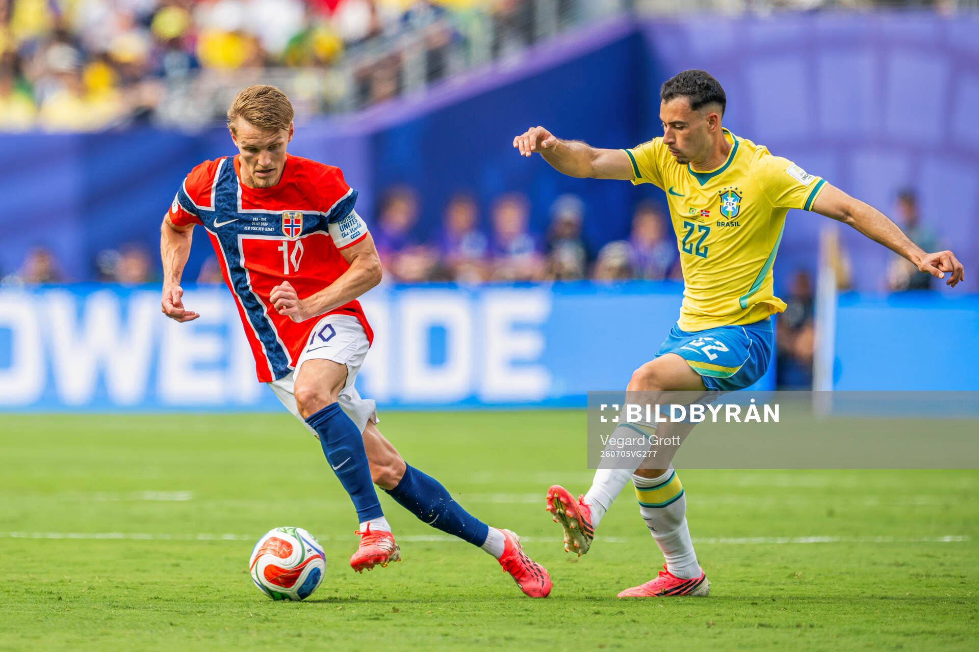 Martin Ødegaard of Norway and Gabriel Martinelli of Brazil