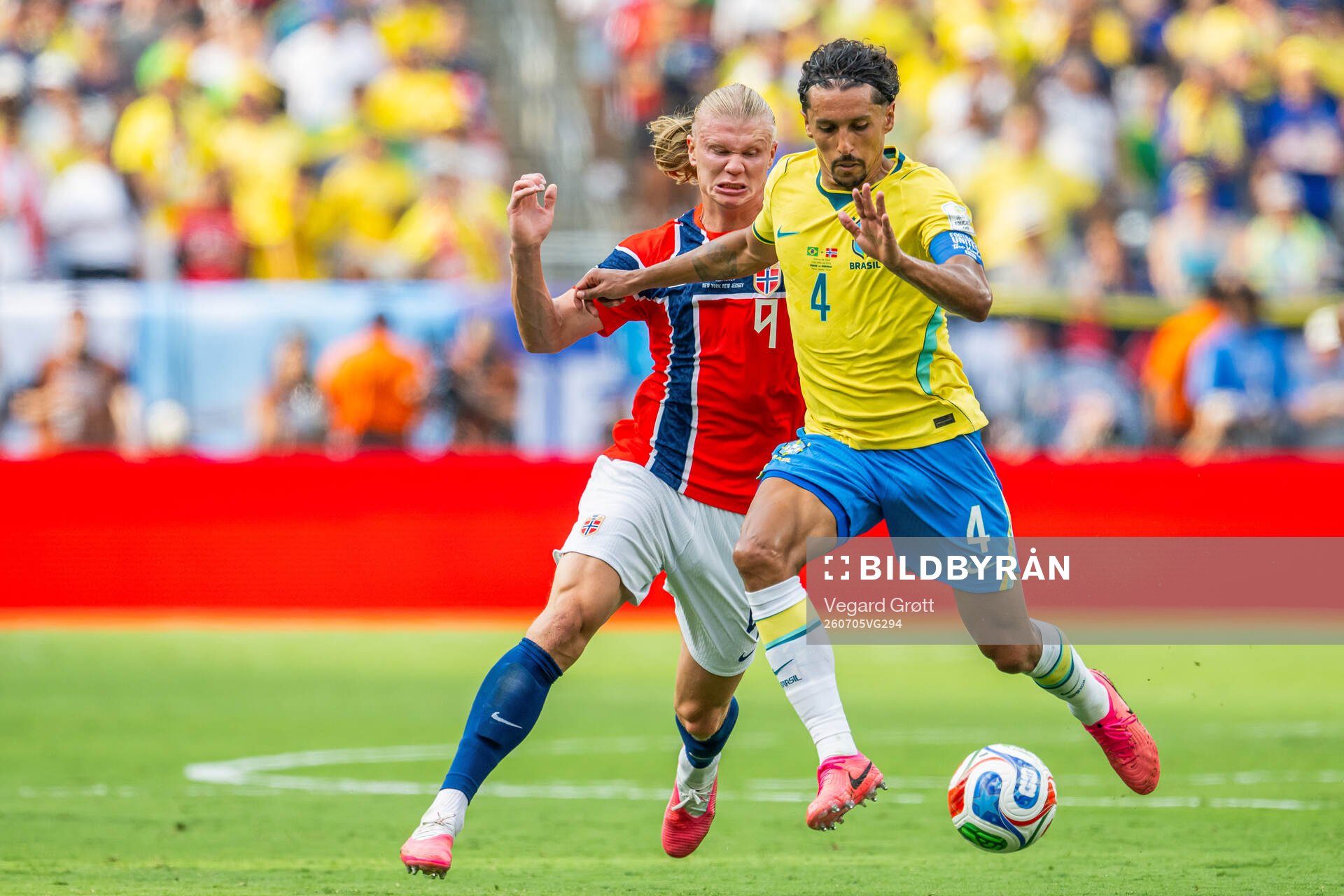 Erling Braut Haaland of Norway and Marquinhos of Brazil