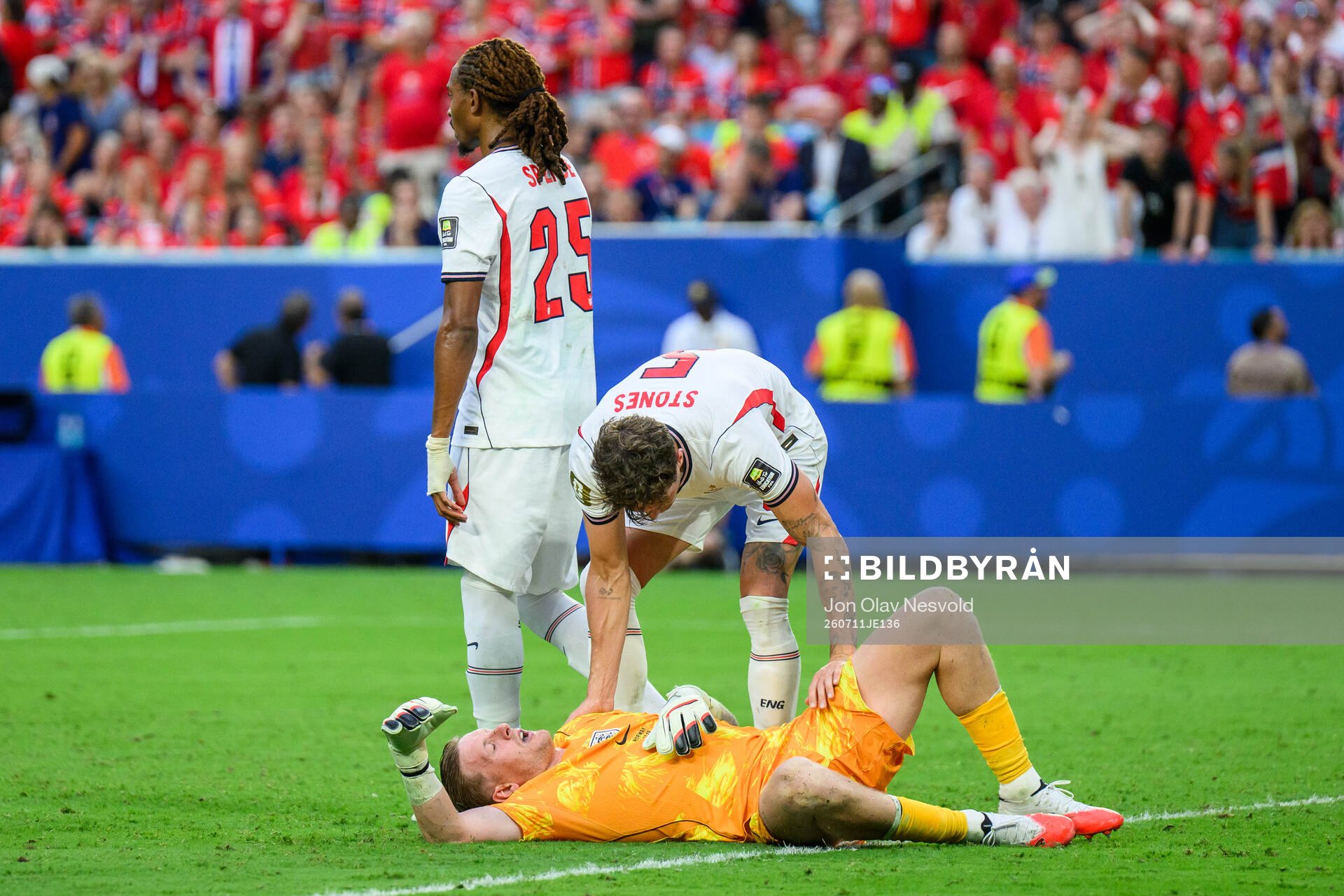 goalkeeper Jordan Pickford of England in pain