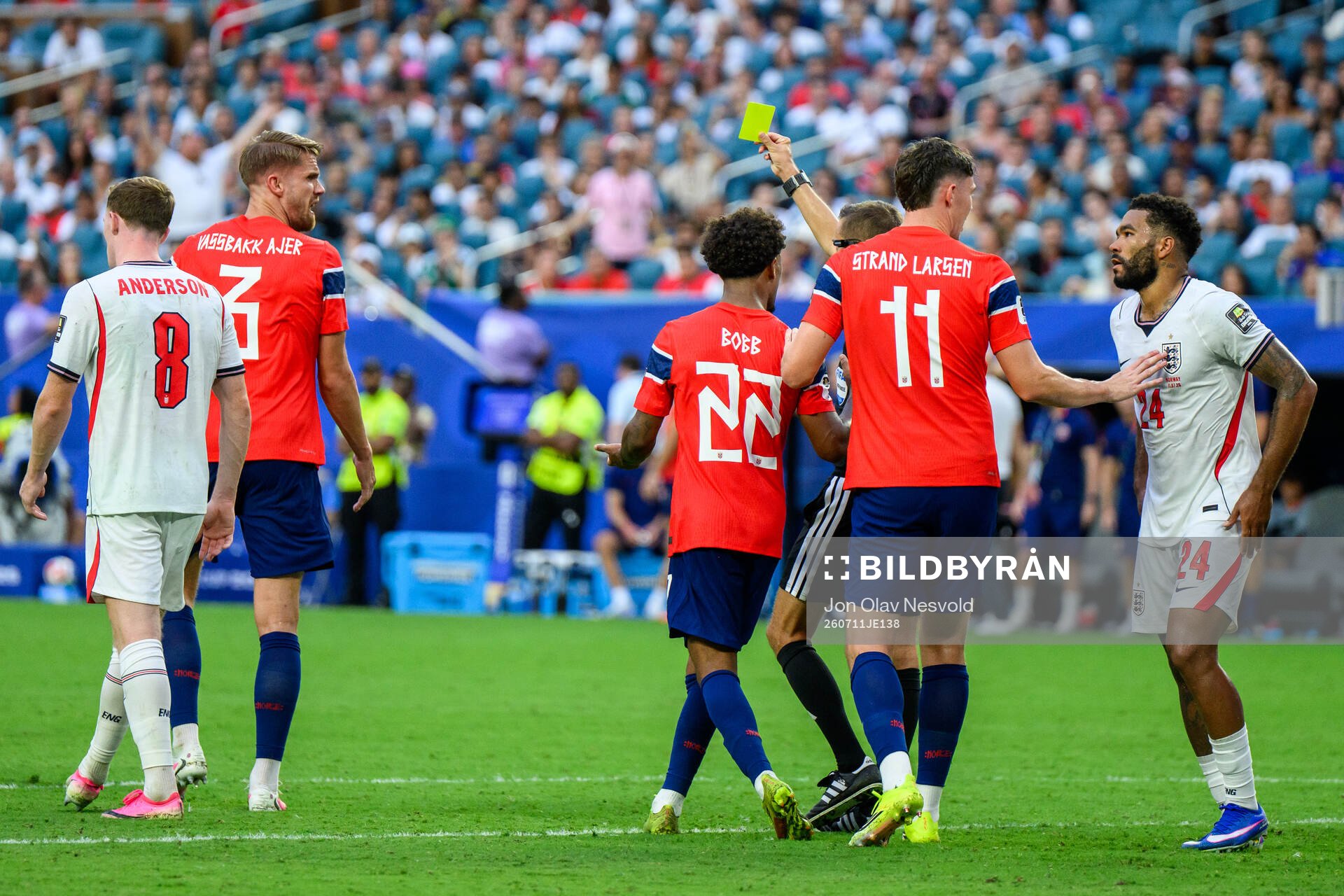 Kristoffer Ajer of Norway is shown a yellow card by Referee