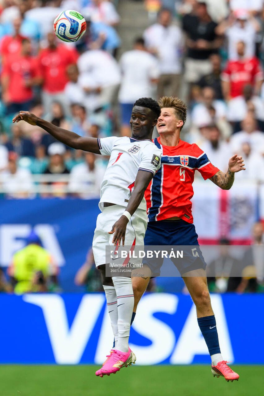 Bukayo Saka of England and David Møller Wolfe of Norway