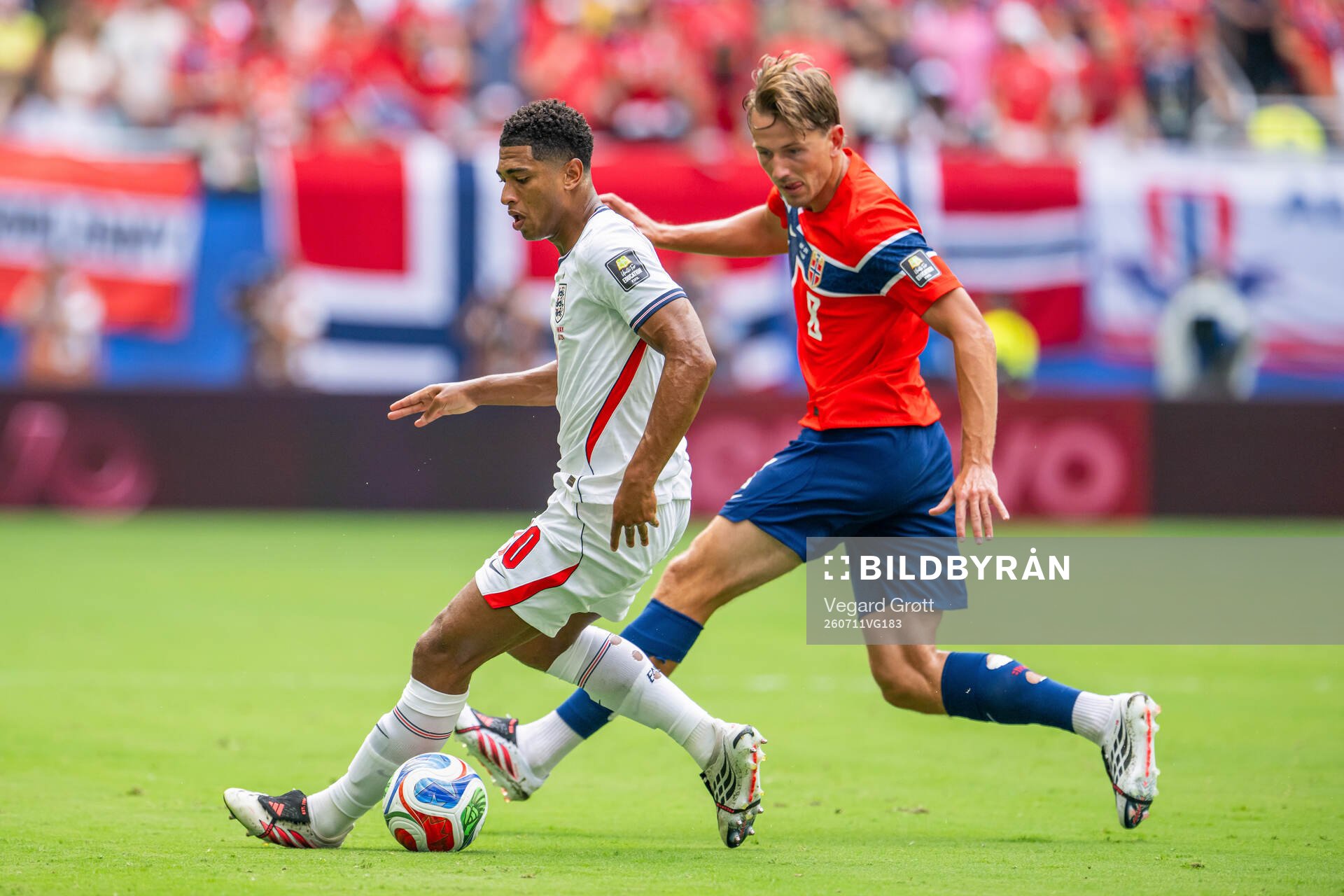 Jude Bellingham of England and Sander Berge of Norway