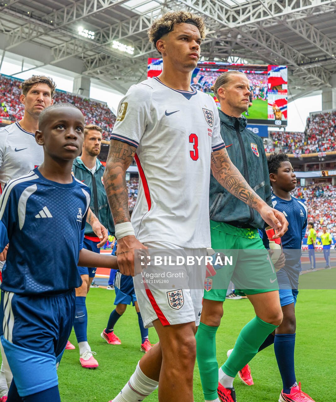 Nico O'Reilly of England and goalkeeper Ørjan Nyland of