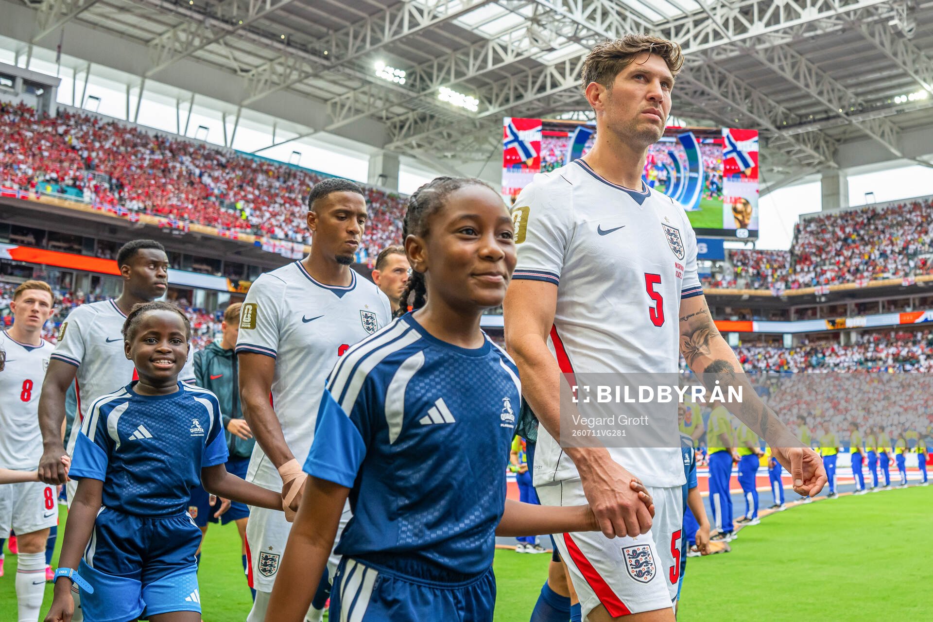 John Stones of England enters the pitch